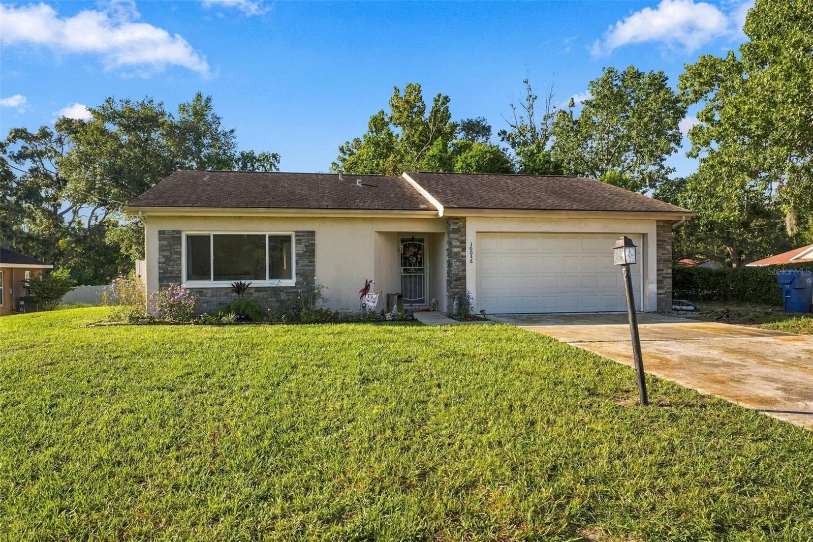 Front Exterior - 10048 AMIDON ST, SPRING HILL