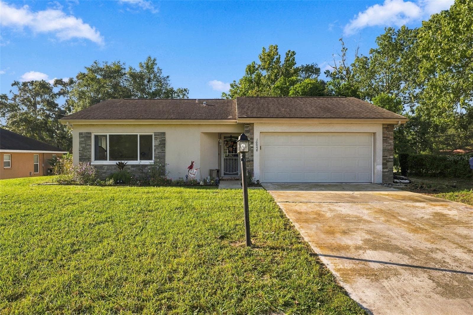 Front Exterior - 10048 AMIDON ST, SPRING HILL