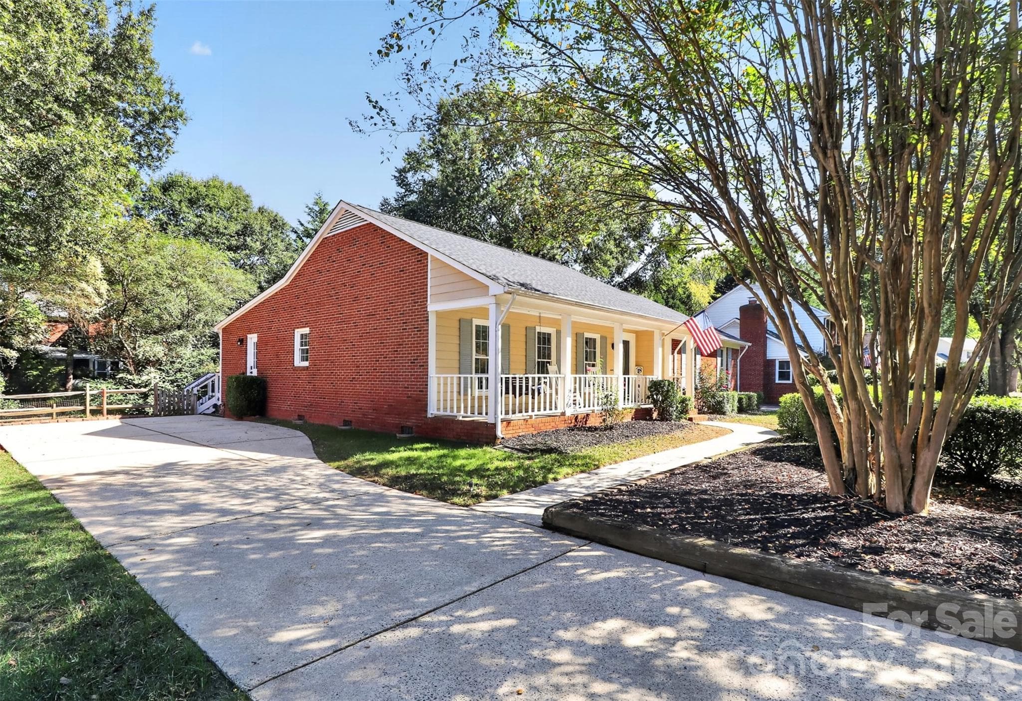 Extra wide parking pad, on large flat lot. Side entry door. - 9915 Ridgemore Drive, Charlotte