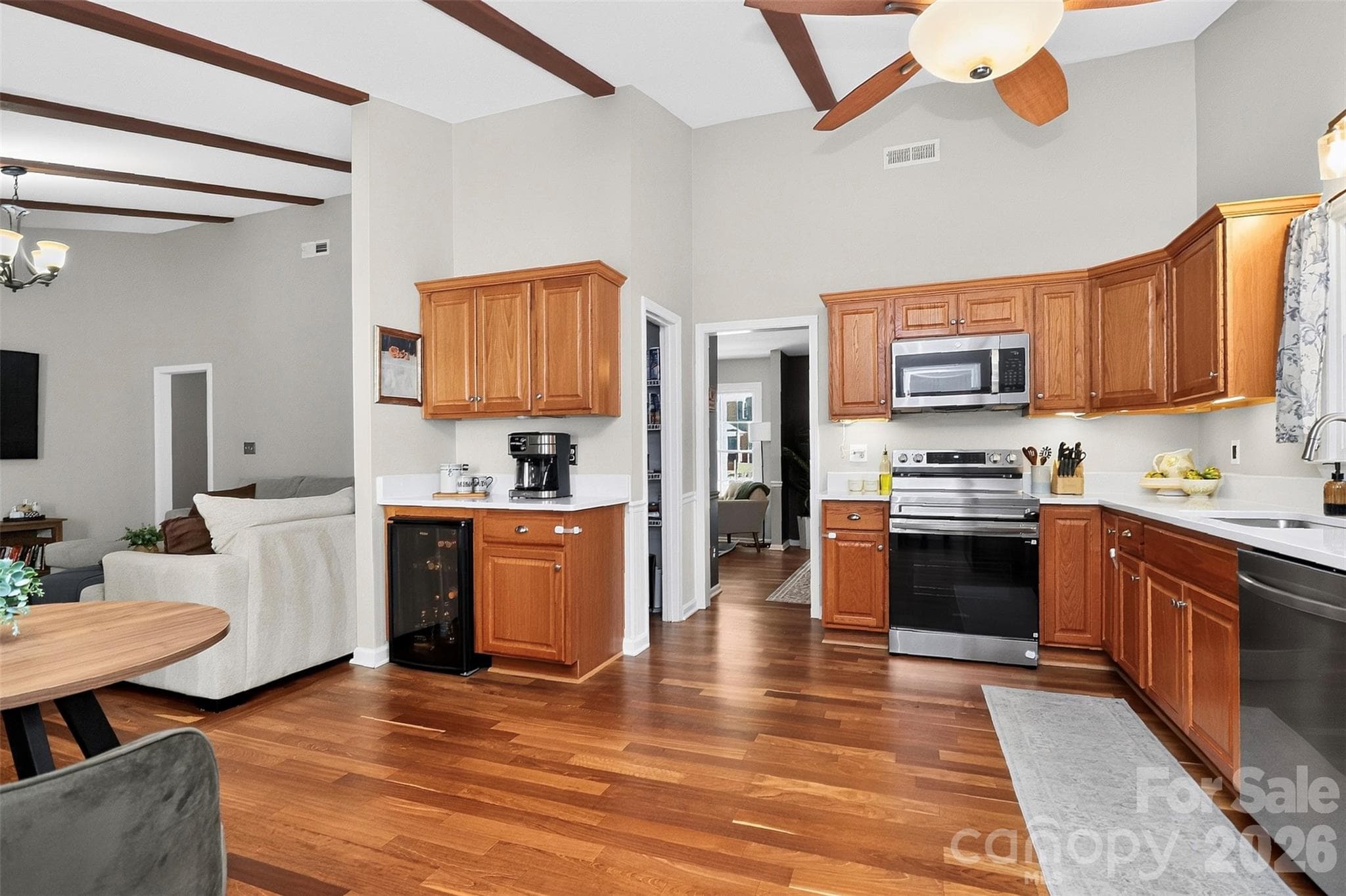 Clever coffee nook with beverage fridge. - 9915 Ridgemore Drive, Charlotte