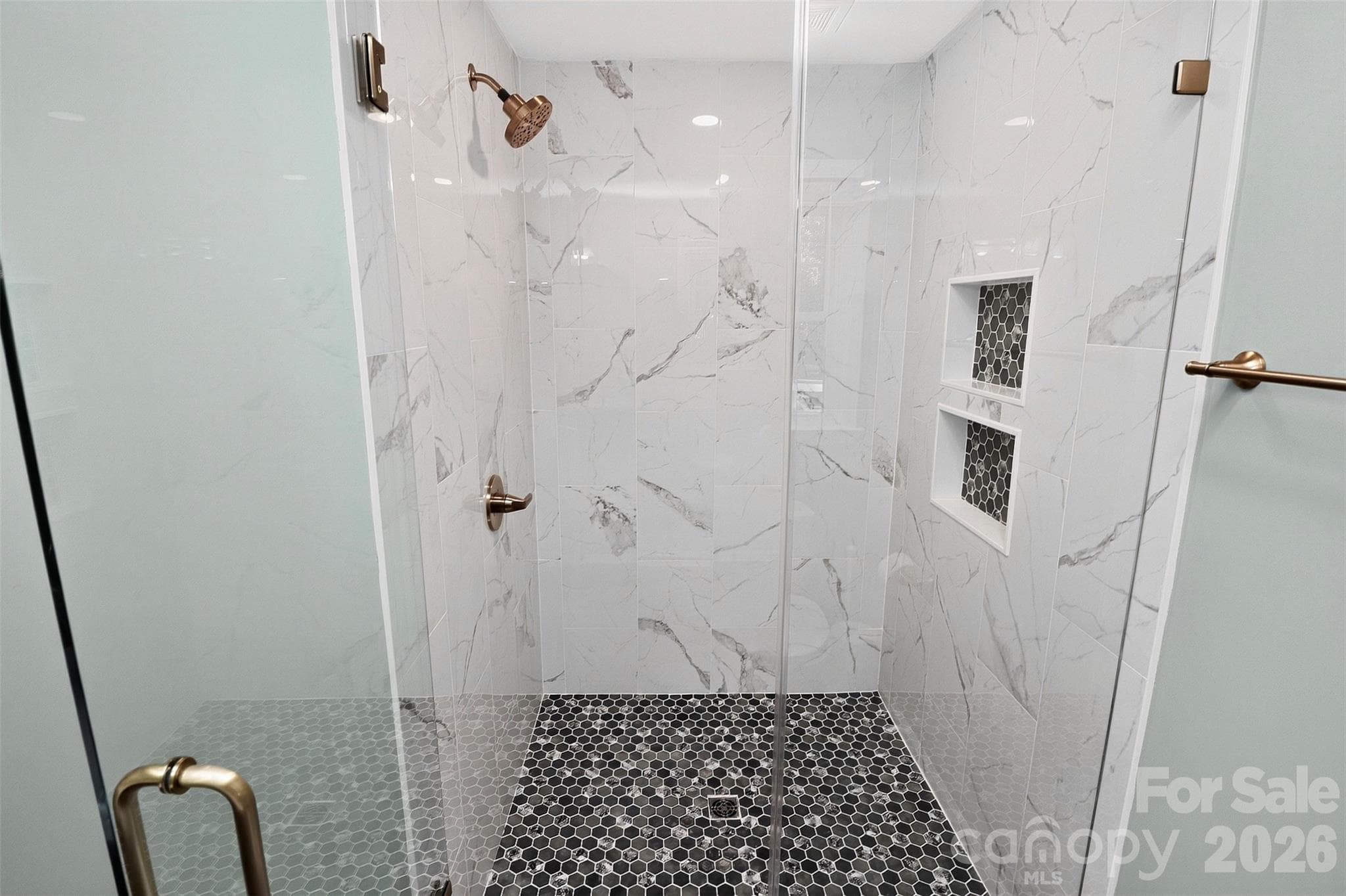 Oversized shower with custom tile. - 9915 Ridgemore Drive, Charlotte