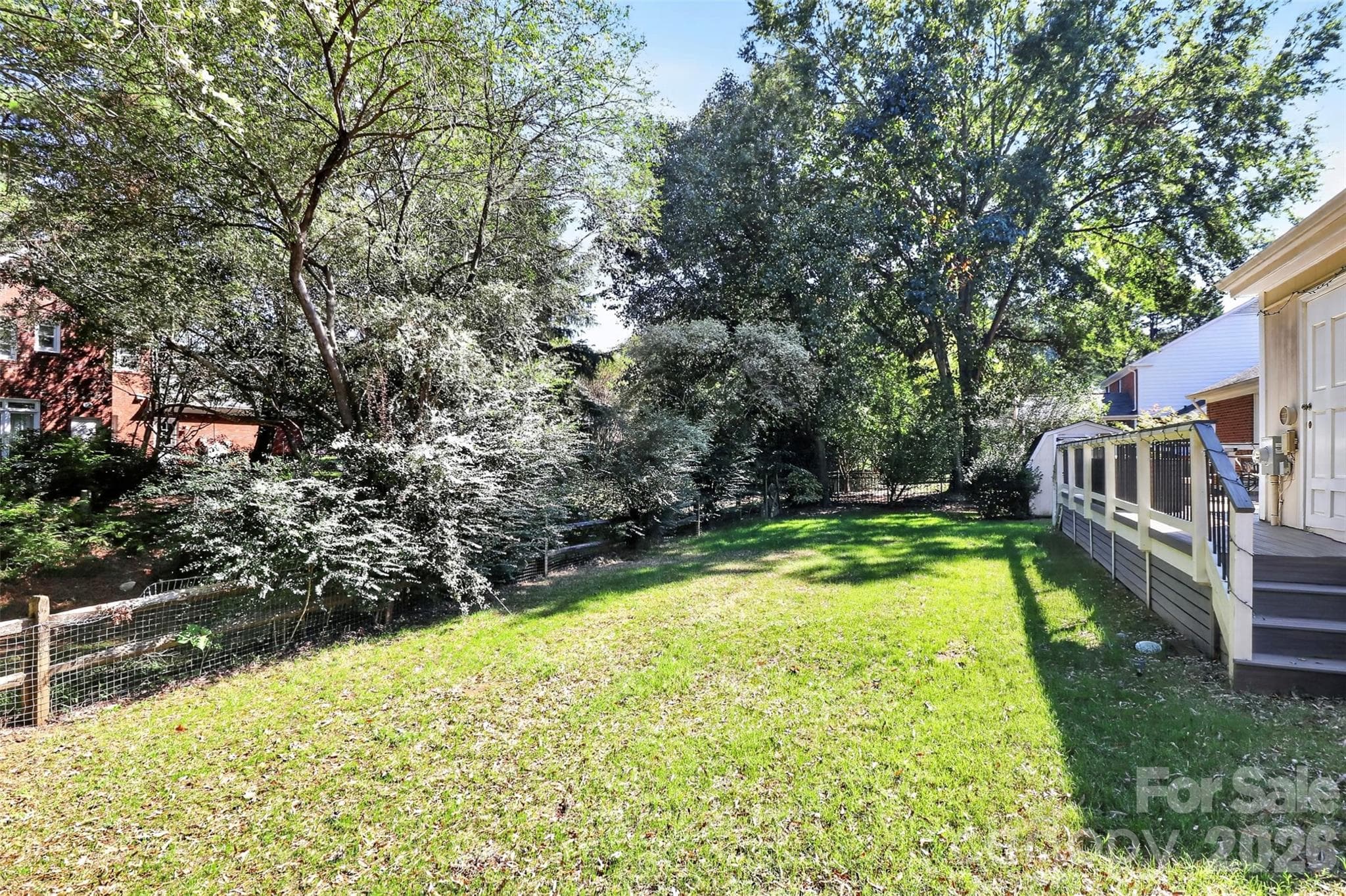 Fully fenced-in flat backyard. - 9915 Ridgemore Drive, Charlotte