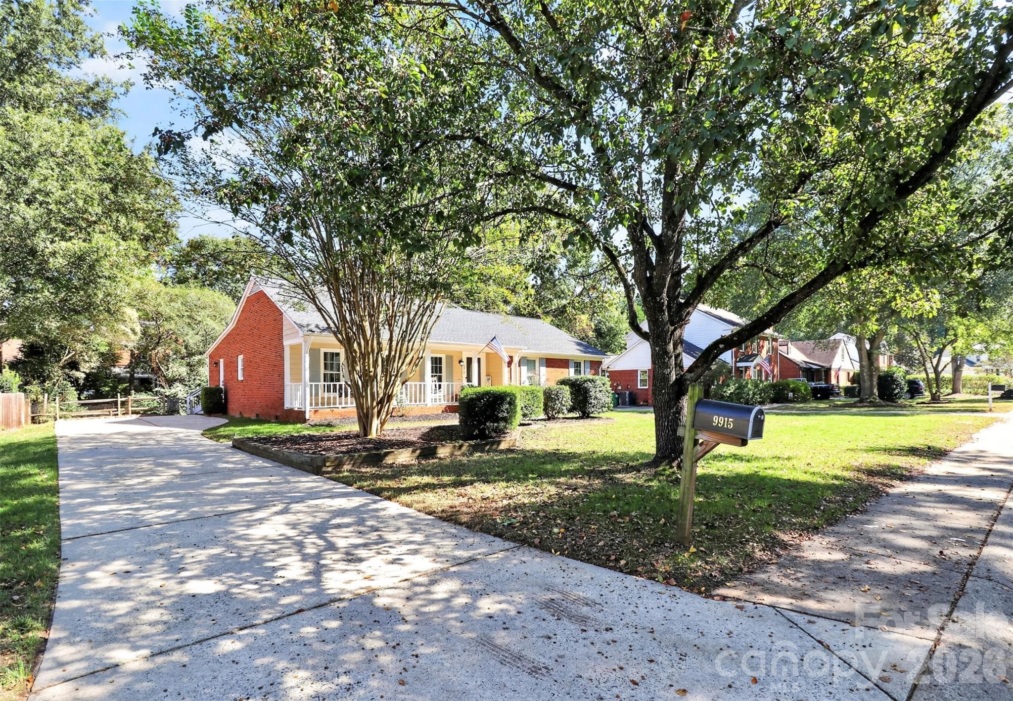 The White Oak community is tree-lined, with sidewalks, and street lights. - 9915 Ridgemore Drive, Charlotte