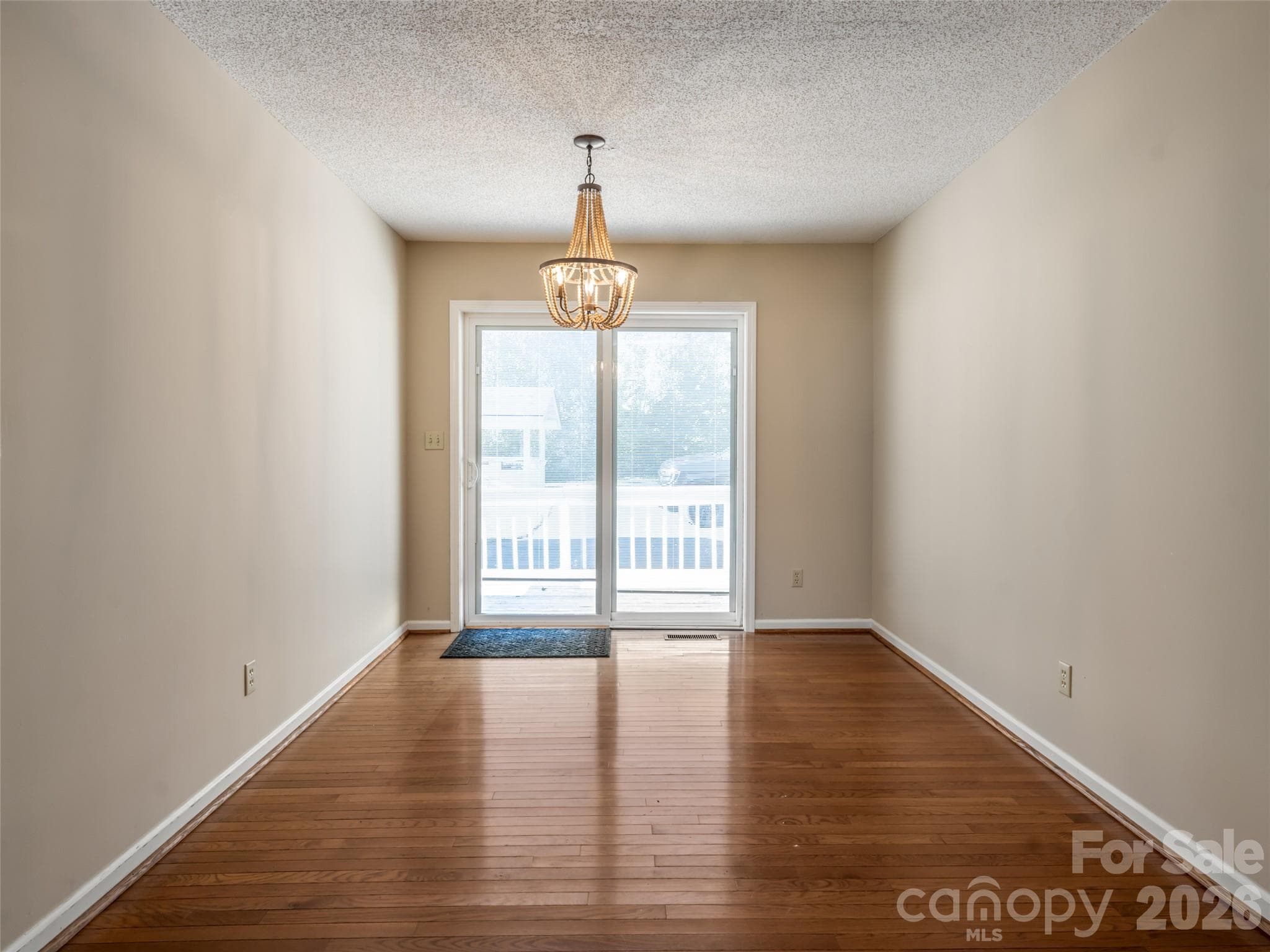 Sunny dining area with outdoor access - 47 Cane Creek Circle, Fairview