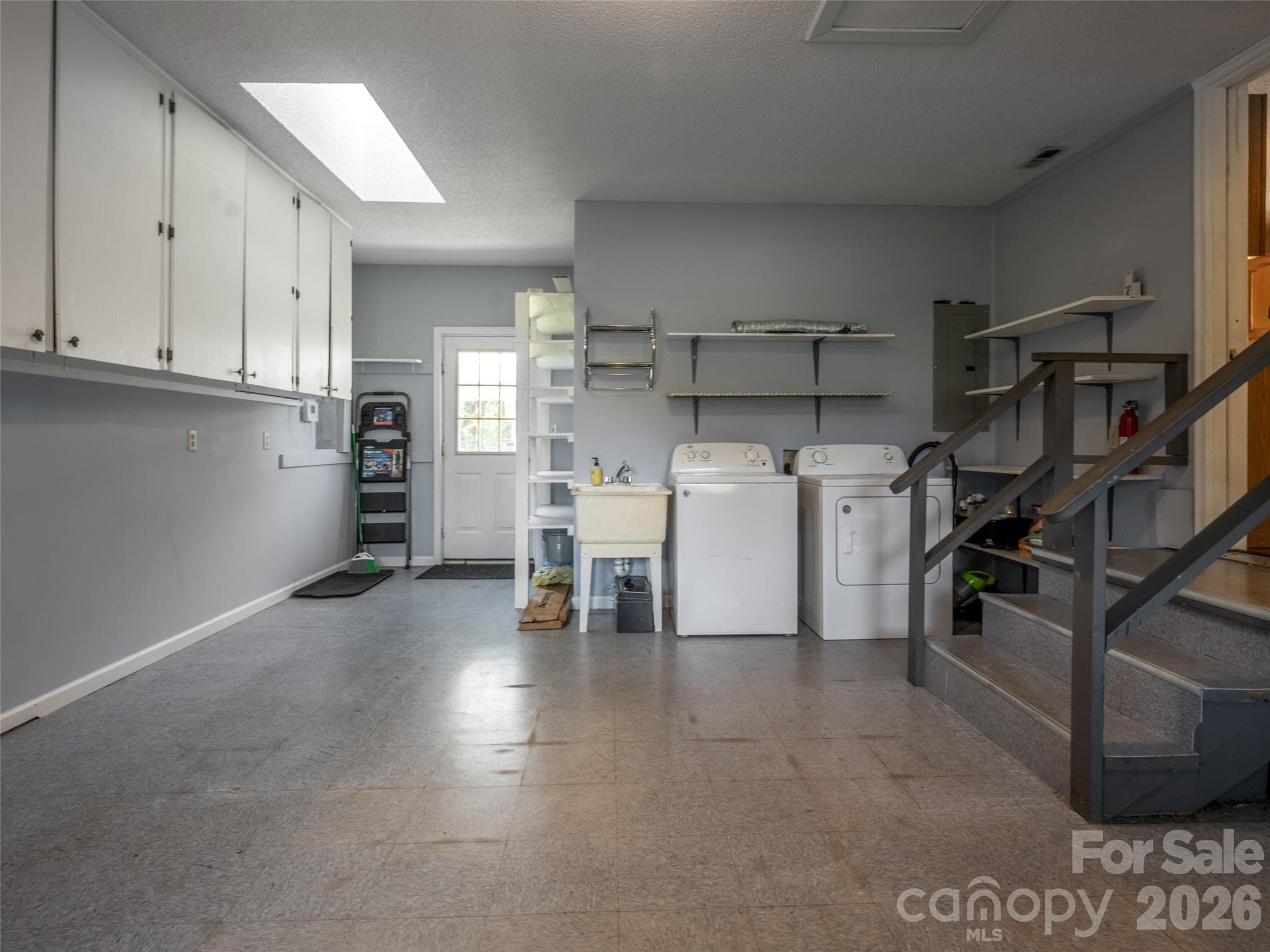 Oversized laundry/storage area on main level - 47 Cane Creek Circle, Fairview