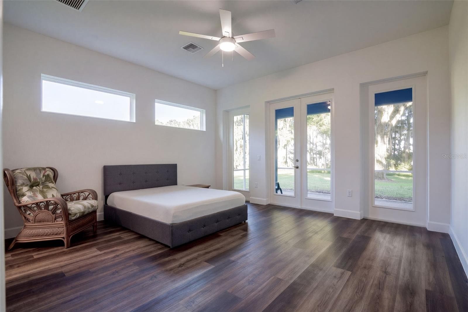Primary suite with French doors straight onto the screened porch - 4410 CORLEY ISLAND RD, LEESBURG