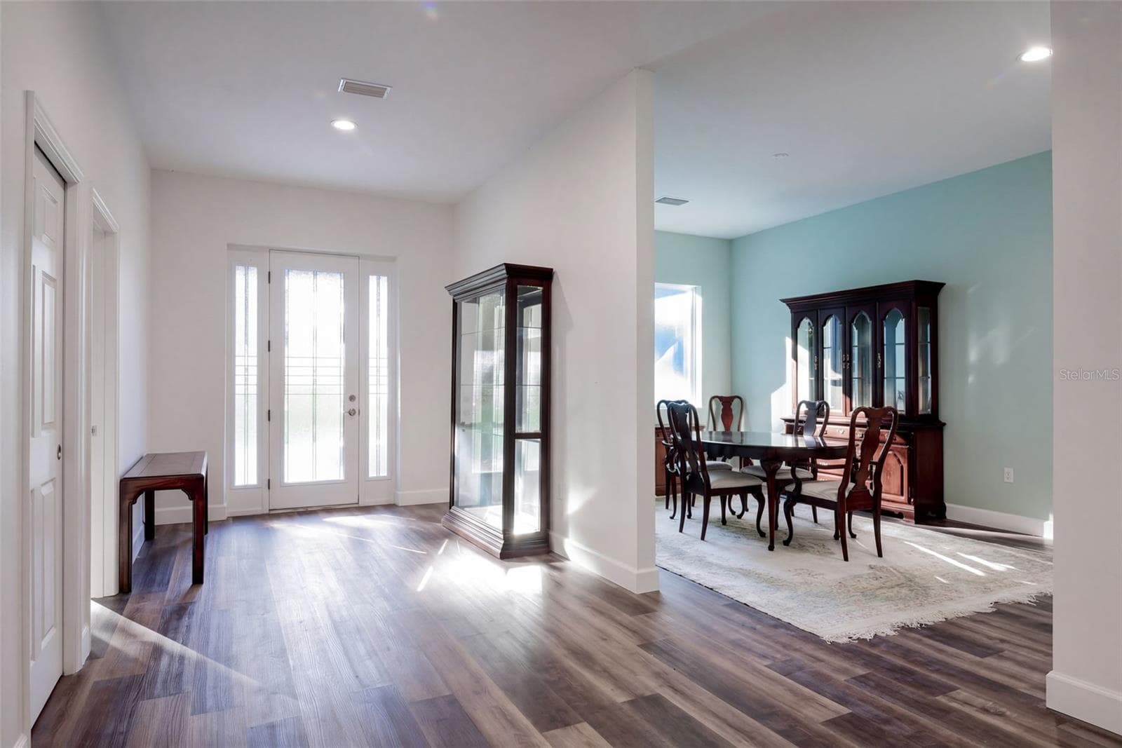 Entry with built-in closet, dining room to the right - 4410 CORLEY ISLAND RD, LEESBURG