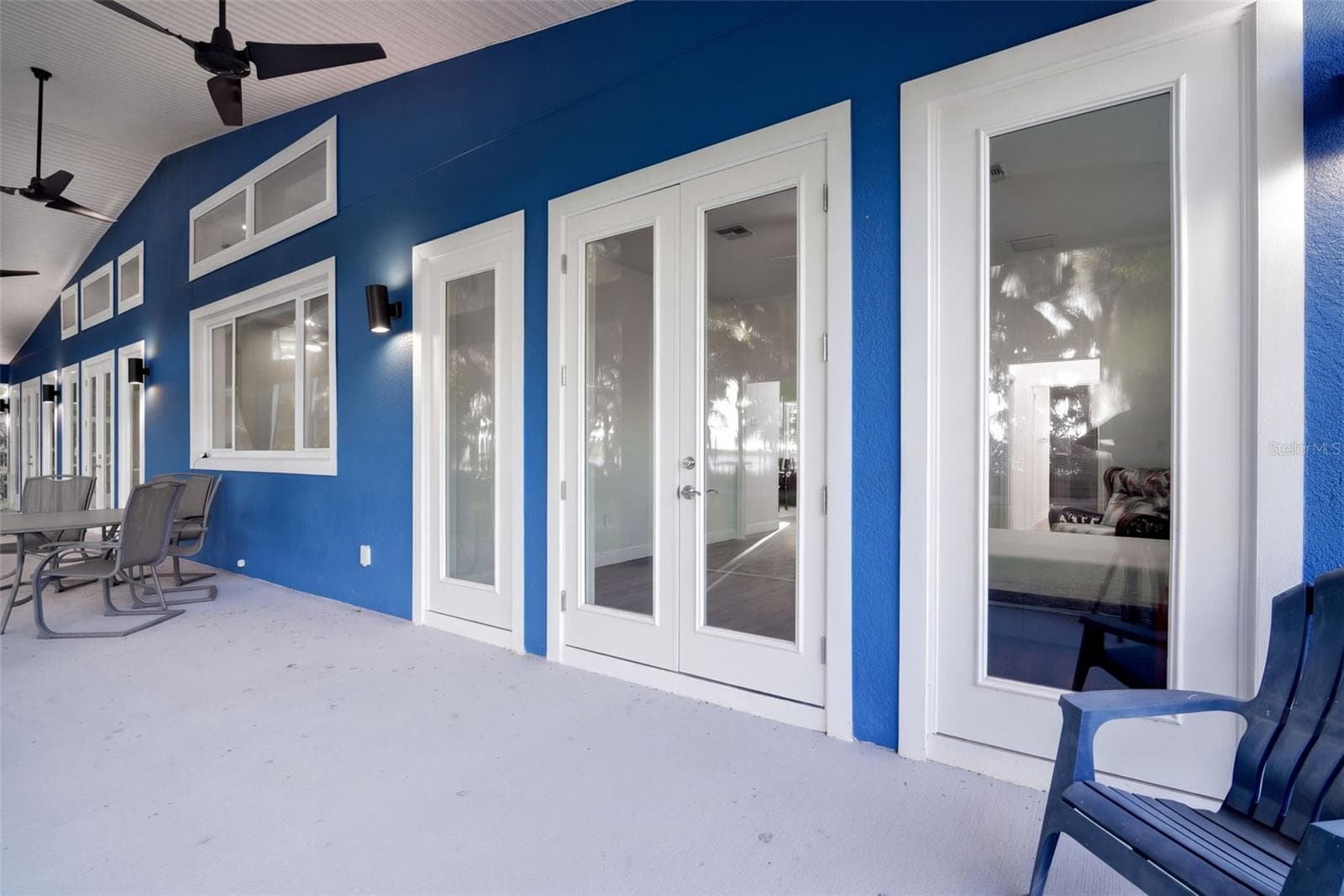 66x10 screened porch with ceiling fans and multiple French door entries - 4410 CORLEY ISLAND RD, LEESBURG