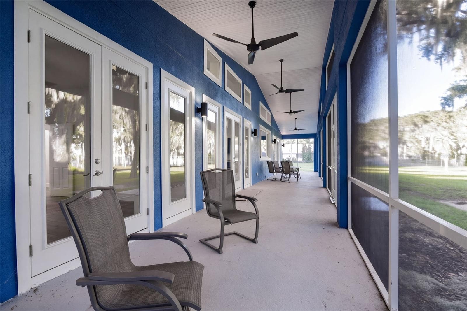 Porch view down the full length of the back of the home - 4410 CORLEY ISLAND RD, LEESBURG