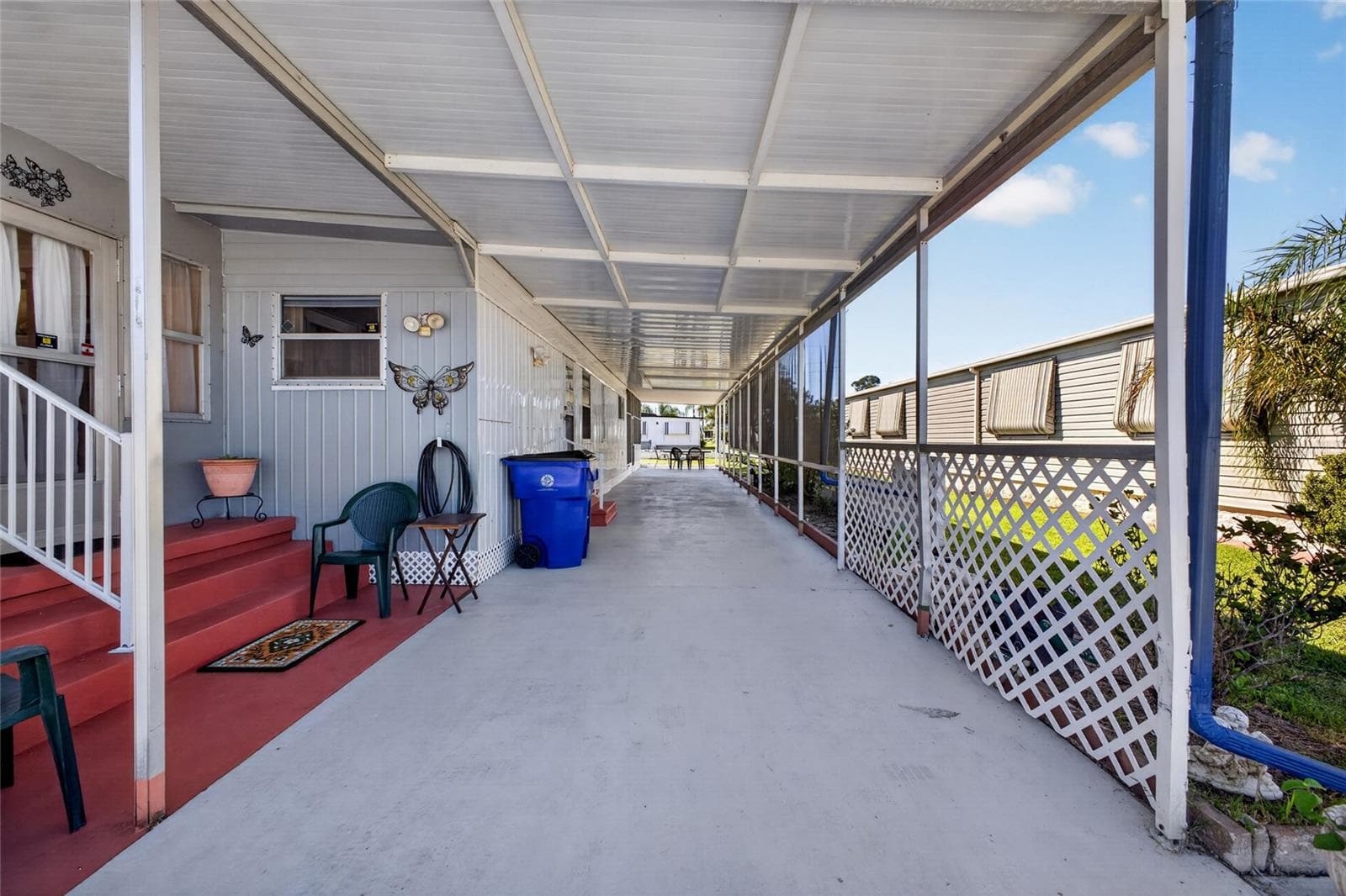 Covered parking extension - 3503 NEW YORK AVE, SEBRING