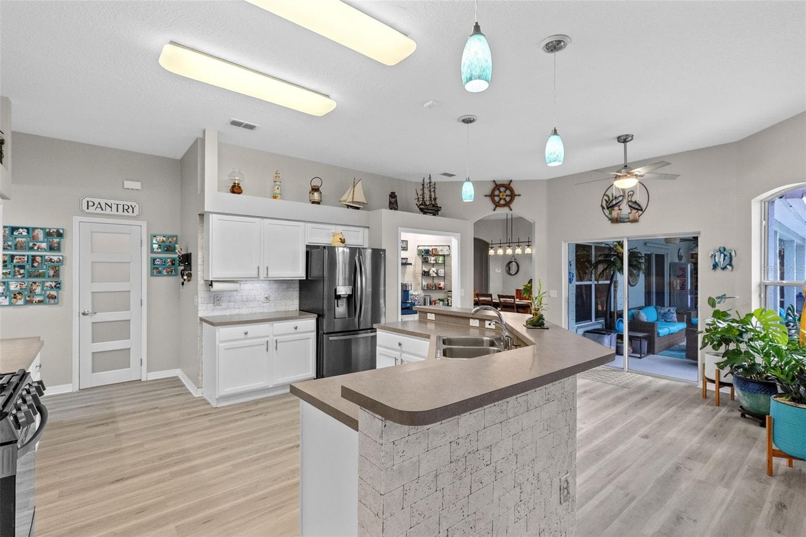 Kitchen to Pantry Closet - 631 COPPER BEECH BLVD, DELTONA