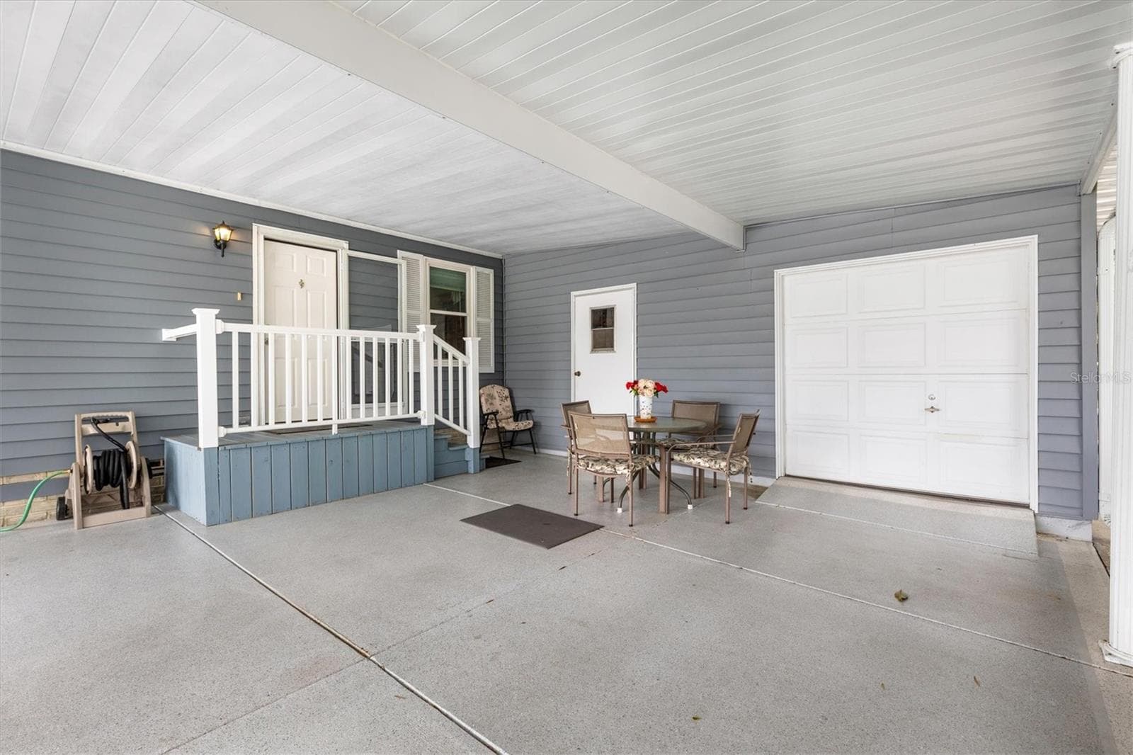 Carport and entrance - 1228 PALMETTO DR, LADY LAKE