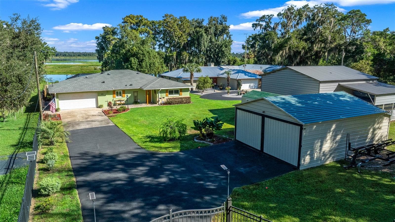 Single Family Residence at 5911 W RIVERBEND RD, DUNNELLON, photo 2 of 58