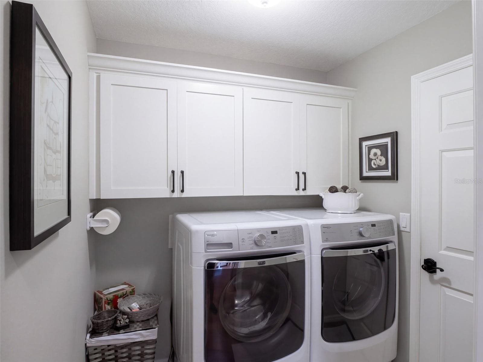 Inside laundry room with access to the garage - 21411 ROYAL TROON DR, LEESBURG
