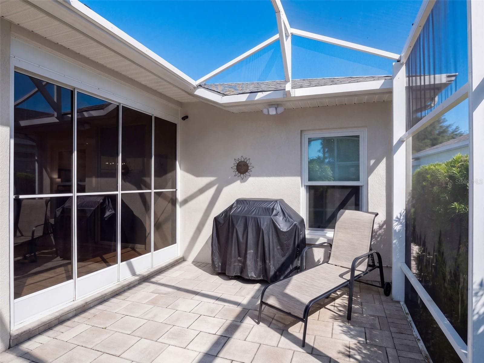 Additionally, a screen lanai on the back of the house with gorgeous conservation views - 21411 ROYAL TROON DR, LEESBURG