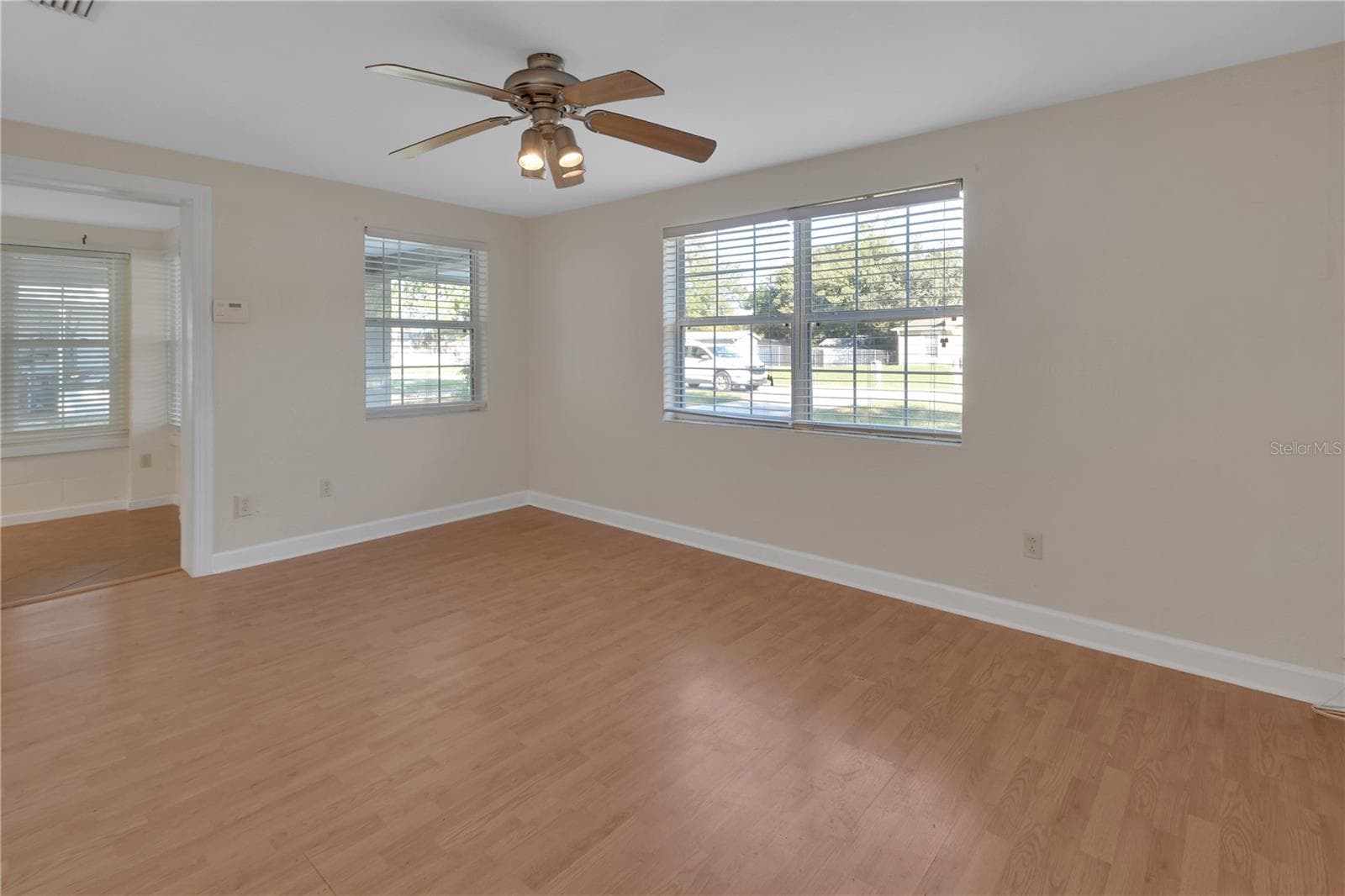 Living room has plenty of natural light - 147 LUCERNE DR, DEBARY