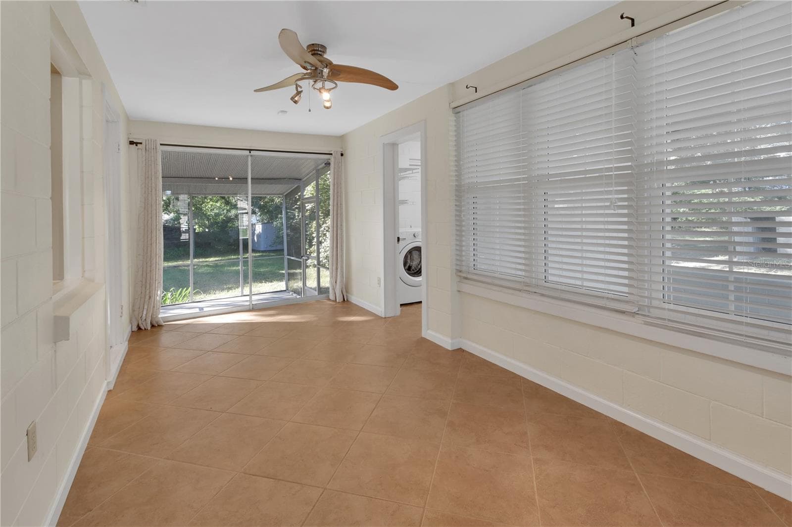 Bonus room with view of screened back porch - 147 LUCERNE DR, DEBARY