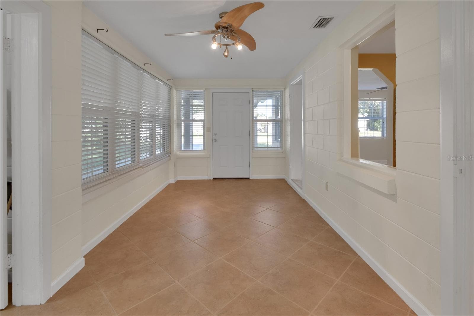 Bonus room with view of front entry - 147 LUCERNE DR, DEBARY