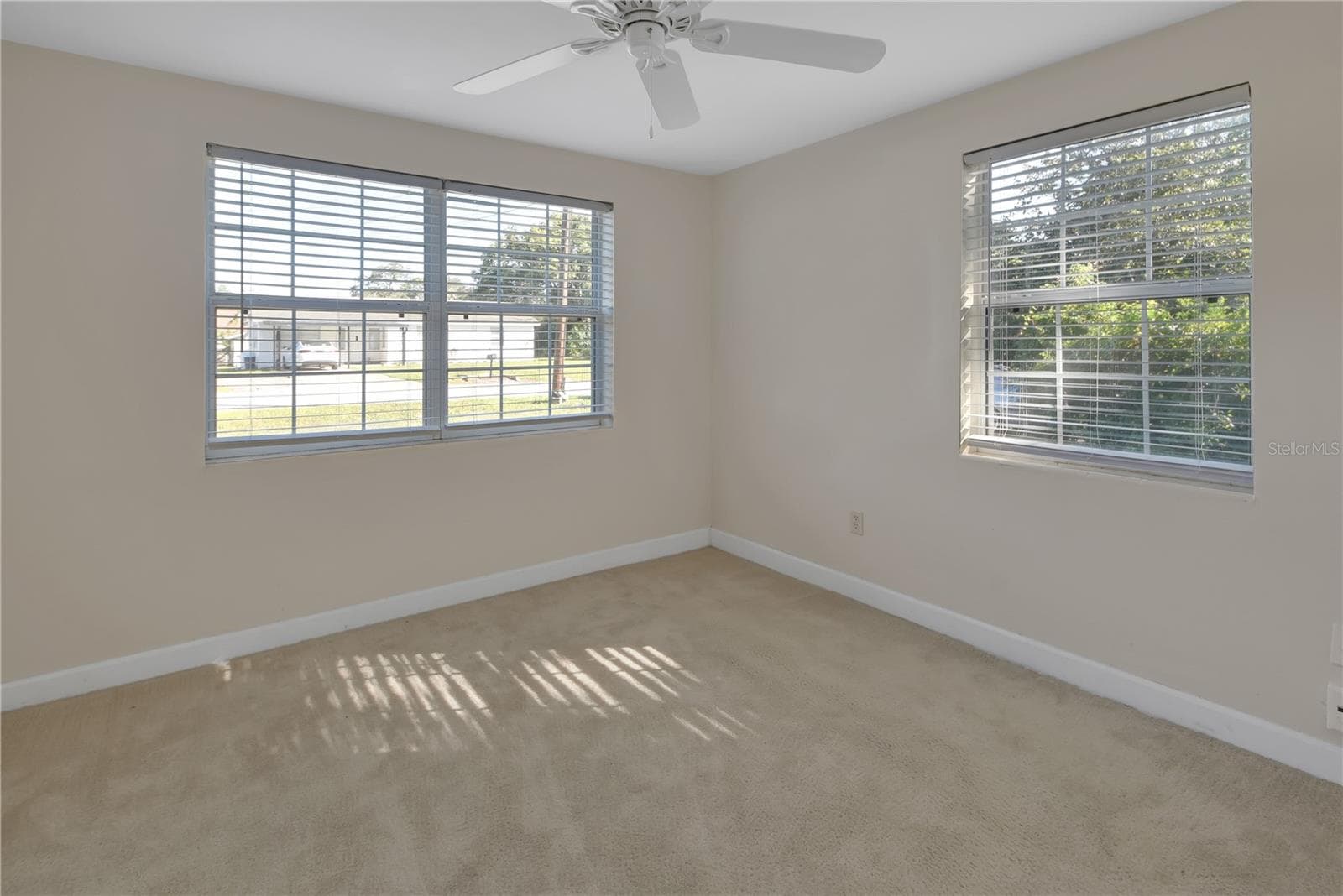 Bedroom 2 at the front of the house - 147 LUCERNE DR, DEBARY