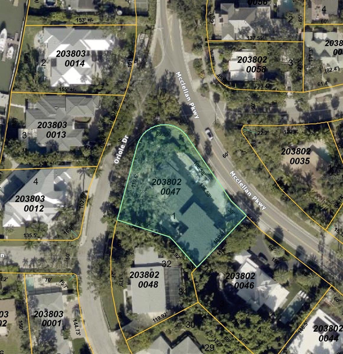 Large lot, with property driveways off McClellan Pkwy and Oriole Dr. - 2100 MCCLELLAN PKWY, SARASOTA