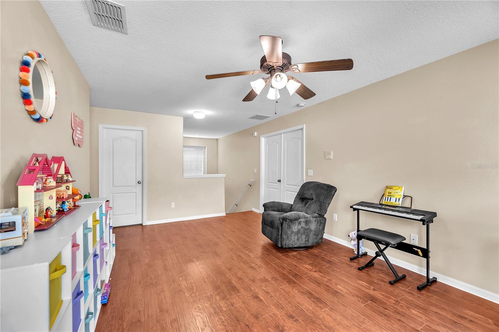 Imagine a fabulous media room, game room, playroom, home office, or cozy second living area. The possibilities are endless! - 18801 SUNTERRA DR, LAND O LAKES