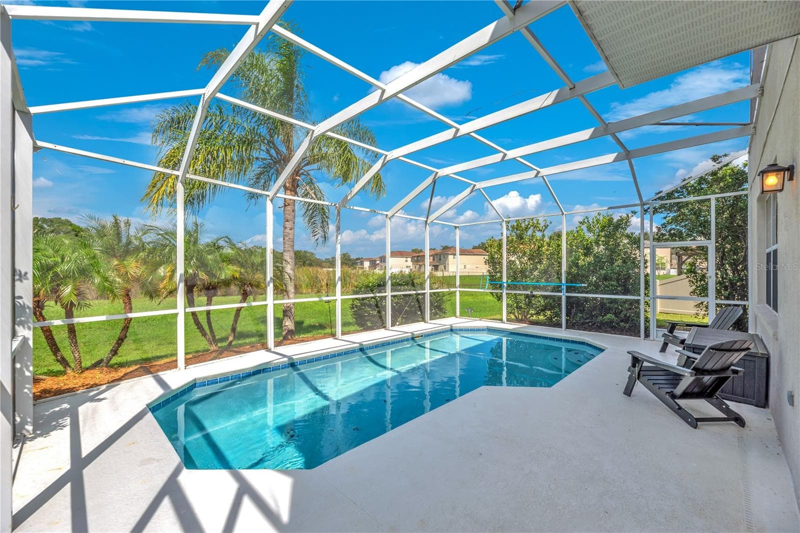 Of course, Florida living is all about enjoying the outdoors, and this home delivers! - 18801 SUNTERRA DR, LAND O LAKES
