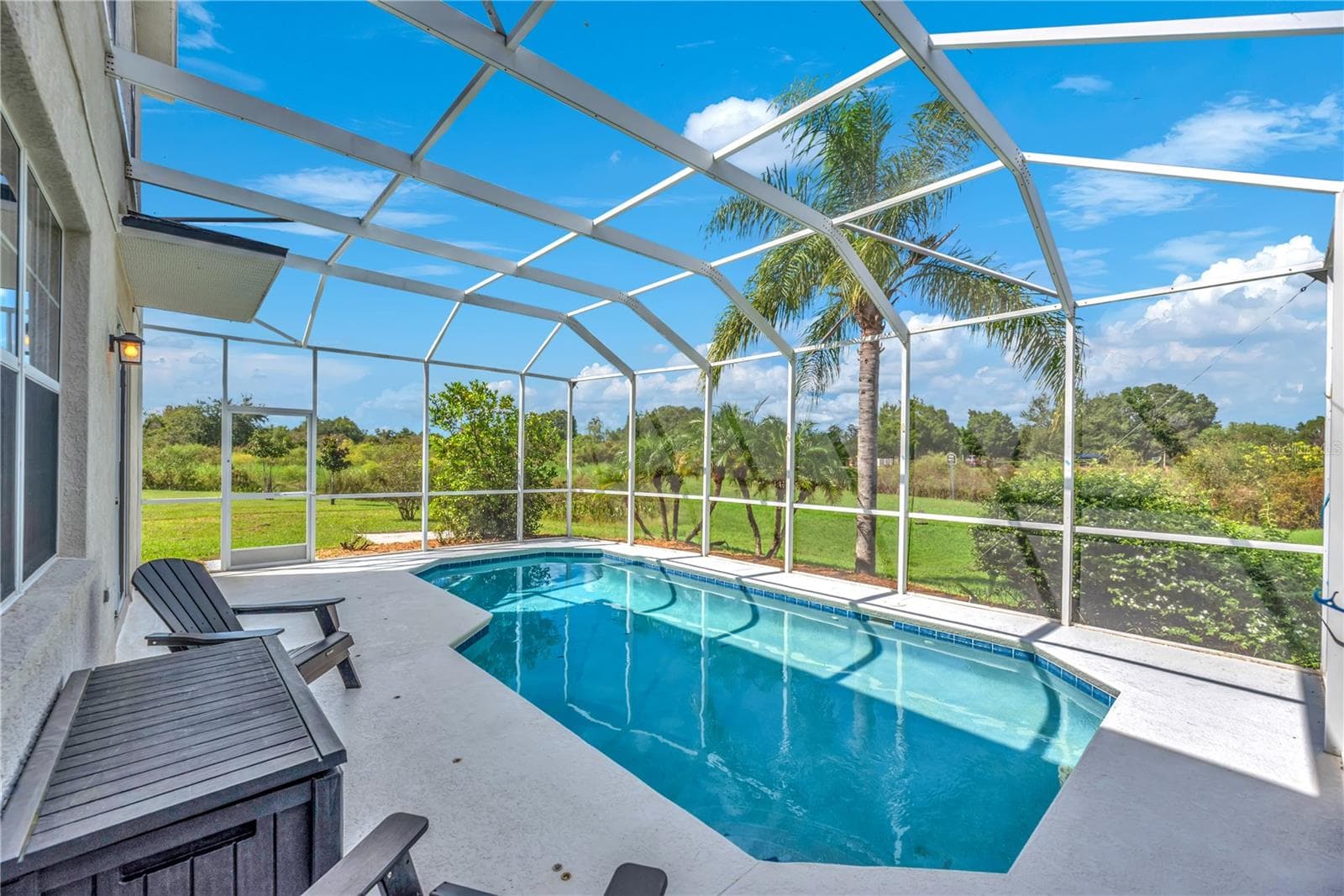 With a pond offering opportunities for fishing, there's something special to enjoy right in your own backyard! - 18801 SUNTERRA DR, LAND O LAKES