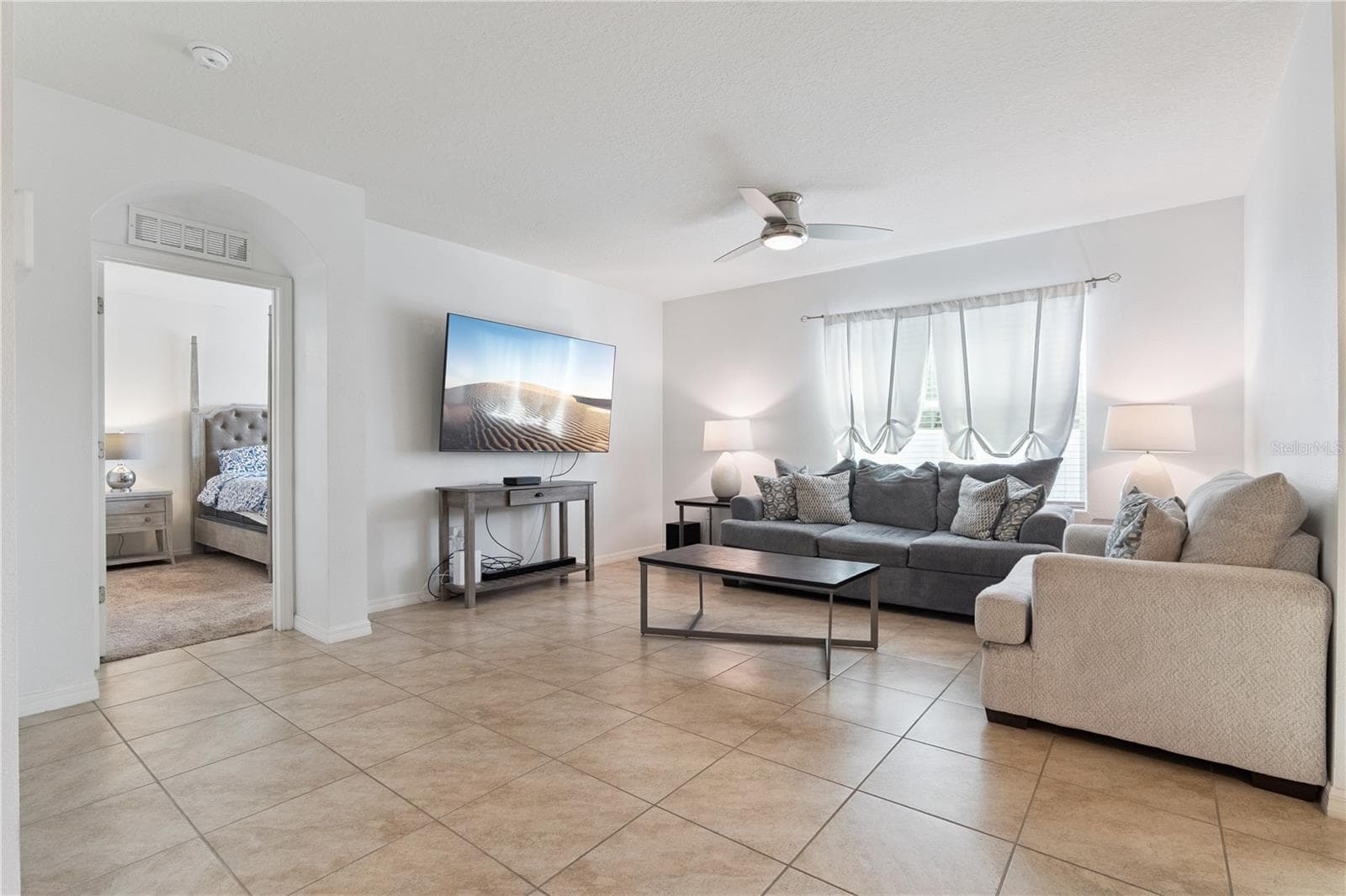 Living Room towards Primary Bedroom - 3139 BETHPAGE LOOP, MOUNT DORA