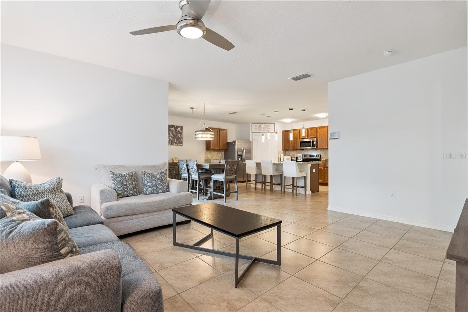 Living Room towards Kitchen - 3139 BETHPAGE LOOP, MOUNT DORA