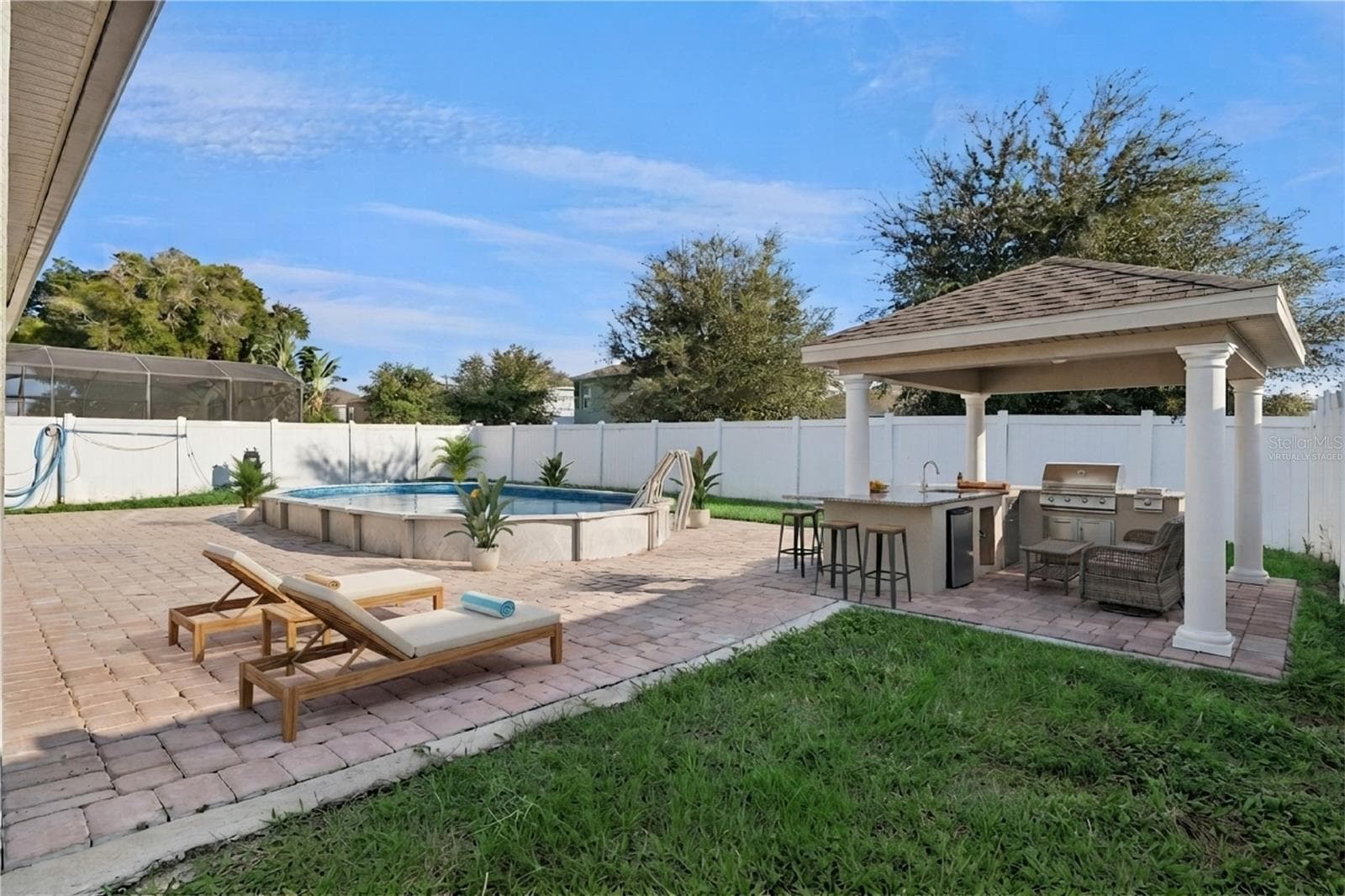 Virtually Staged - Rear Yard Proposed Outdoor Kitchen/Grill - 3139 BETHPAGE LOOP, MOUNT DORA