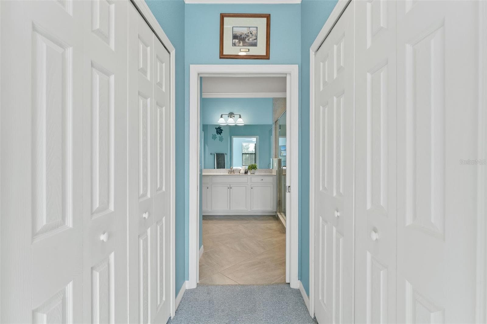 hallway in primary bedroom - 12480 GHIBERTI CIR #201, VENICE