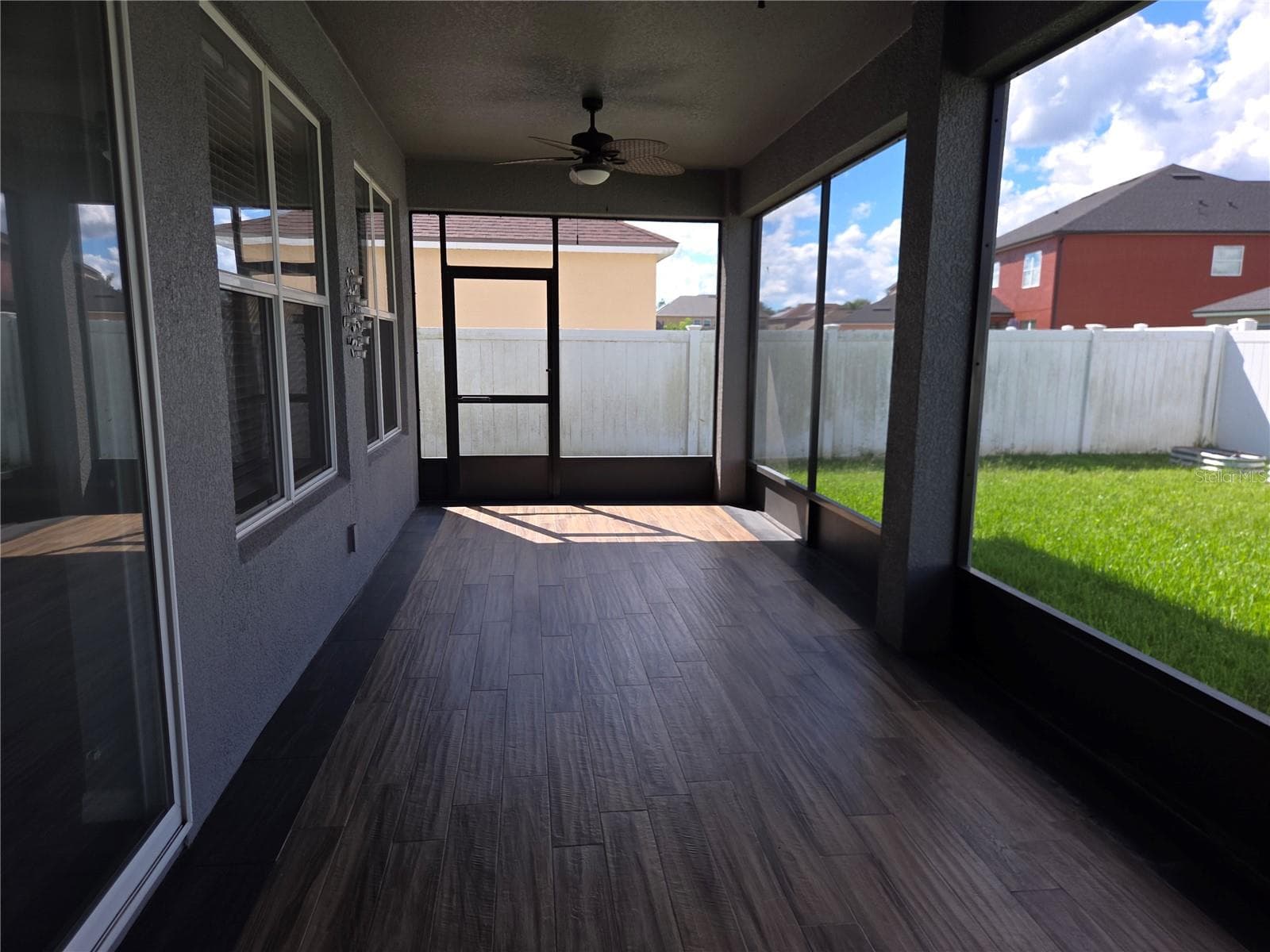 view of lanai from primary bedroom - 4620 CYPRESS LANDING LN, ST CLOUD