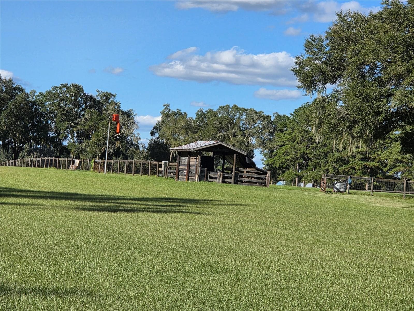 Wind sock and small Hay Storage next to the North Pasture area - 950 W HIGHWAY 316, CITRA