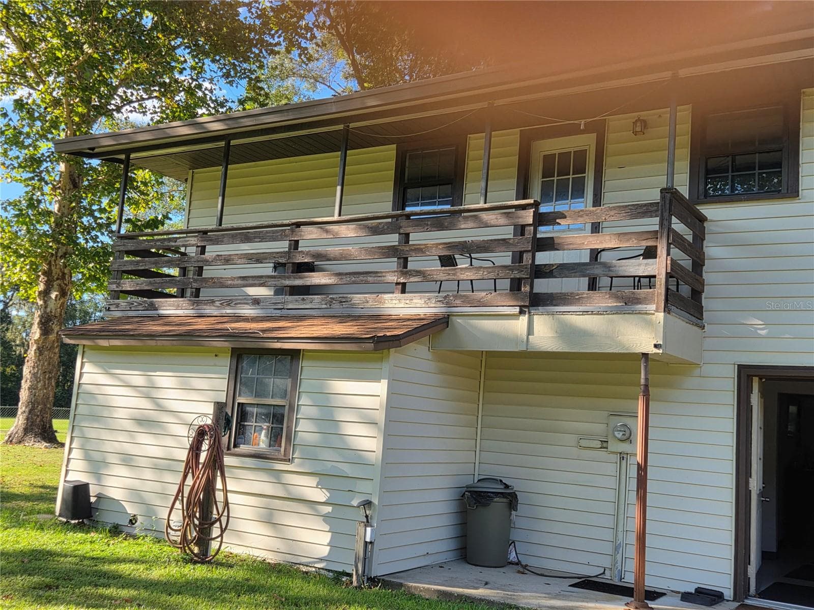 Hanger Side of the house with a Generator transfer switch under the porch by the electric meter - 950 W HIGHWAY 316, CITRA