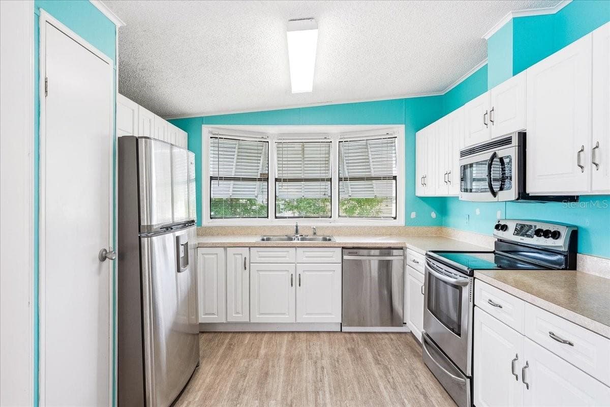Manufactured Home at 10074 BROKEN WOODS CT, NORTH FORT MYERS, photo 6 of 44