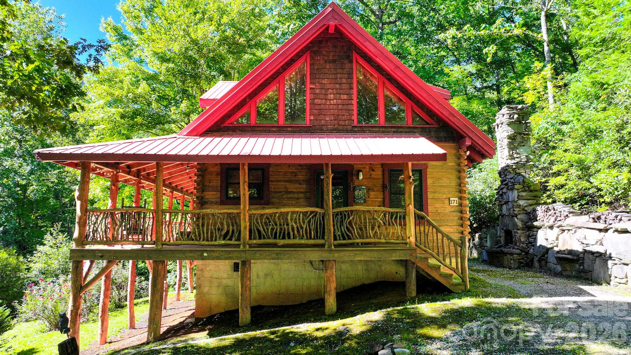 Wrap around porch with Mountain Laurel deck pickets. - 171 Camp Elliott Road, Black Mountain