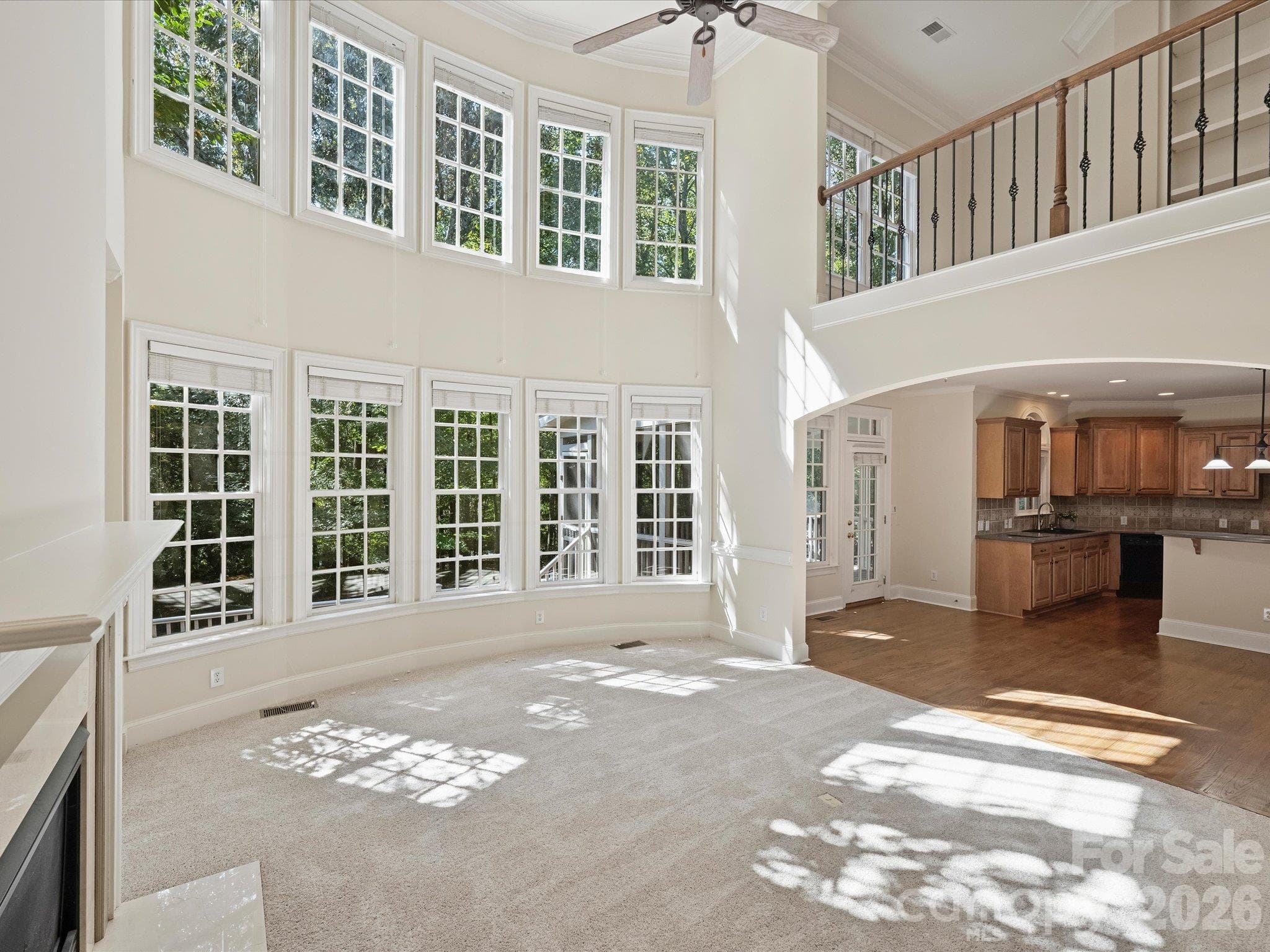 The wooded lot sends in dappled sunlight - 7705 Stonehaven Drive, Waxhaw
