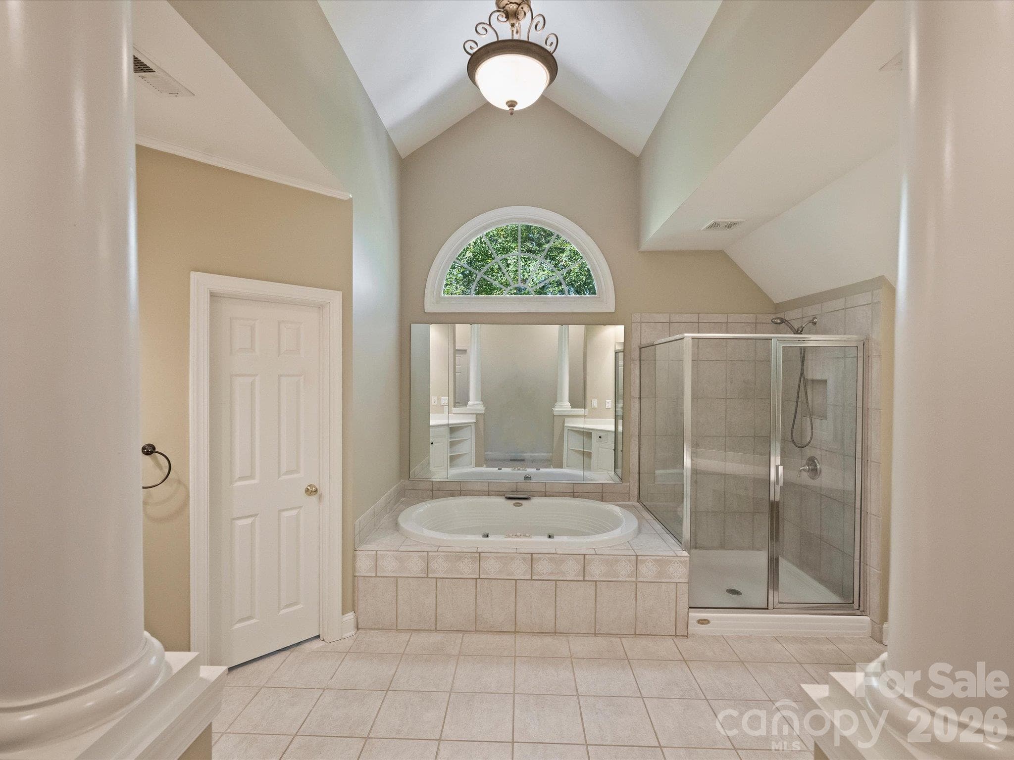 Large primary bath with soaking tub and separate shower - 7705 Stonehaven Drive, Waxhaw