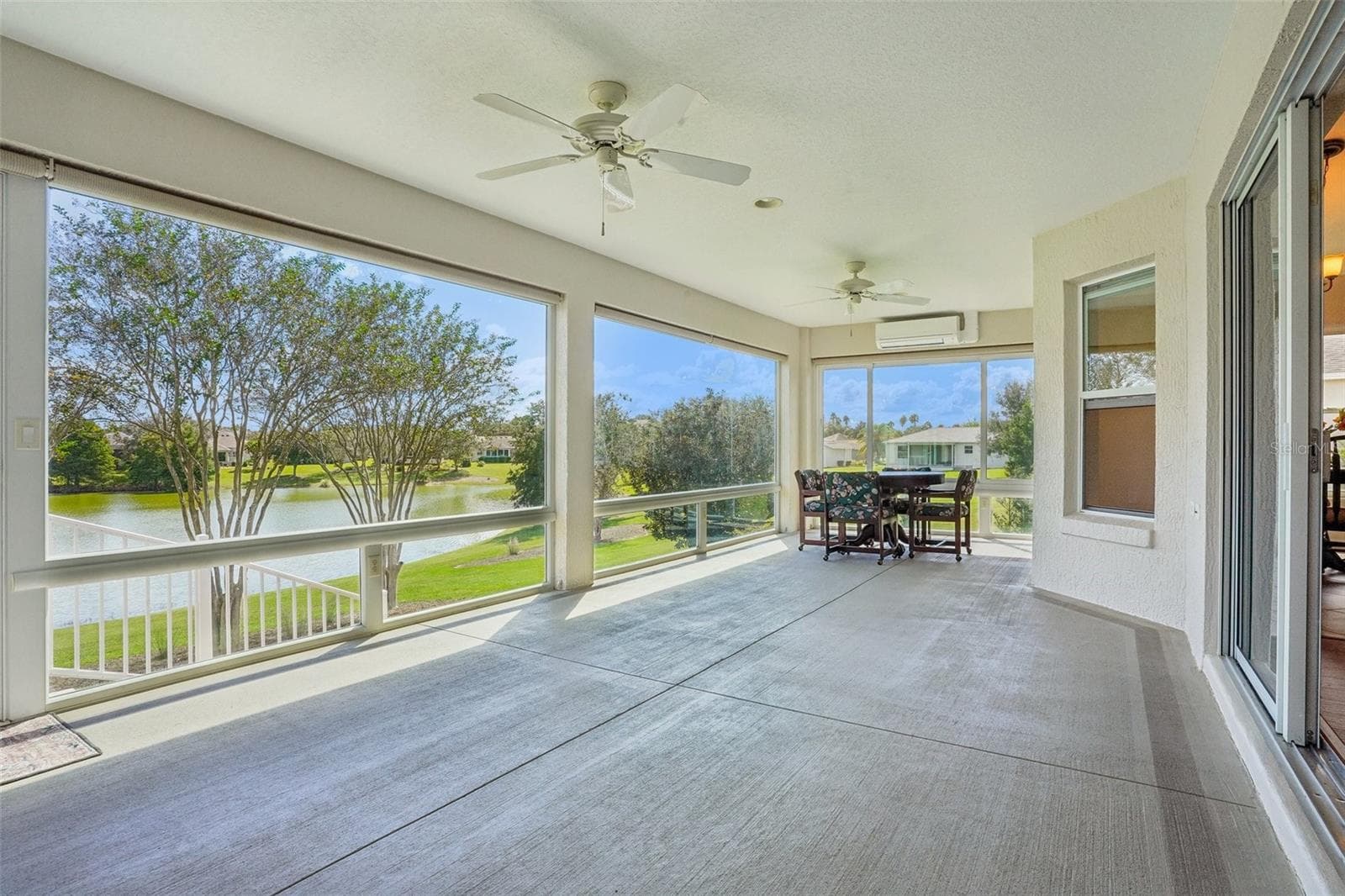 Enclosed Lanai with Panoramic Elevated Water View - 494 ARBELLA LOOP, THE VILLAGES