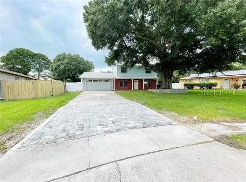 long driveway - 2506 PARADISE CIR, KISSIMMEE