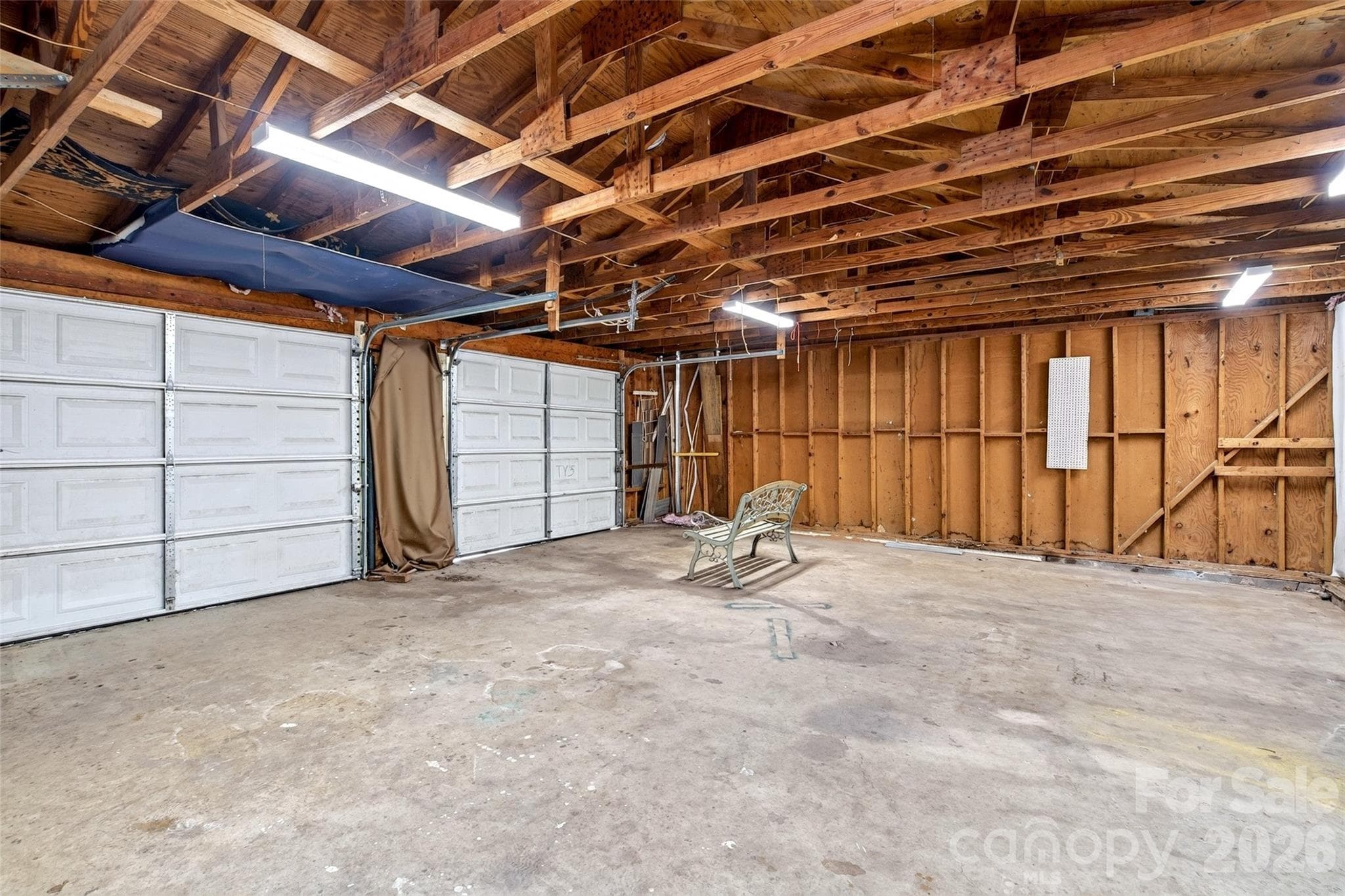 Inside garage. - 432 & 422 E Main Street, Old Fort