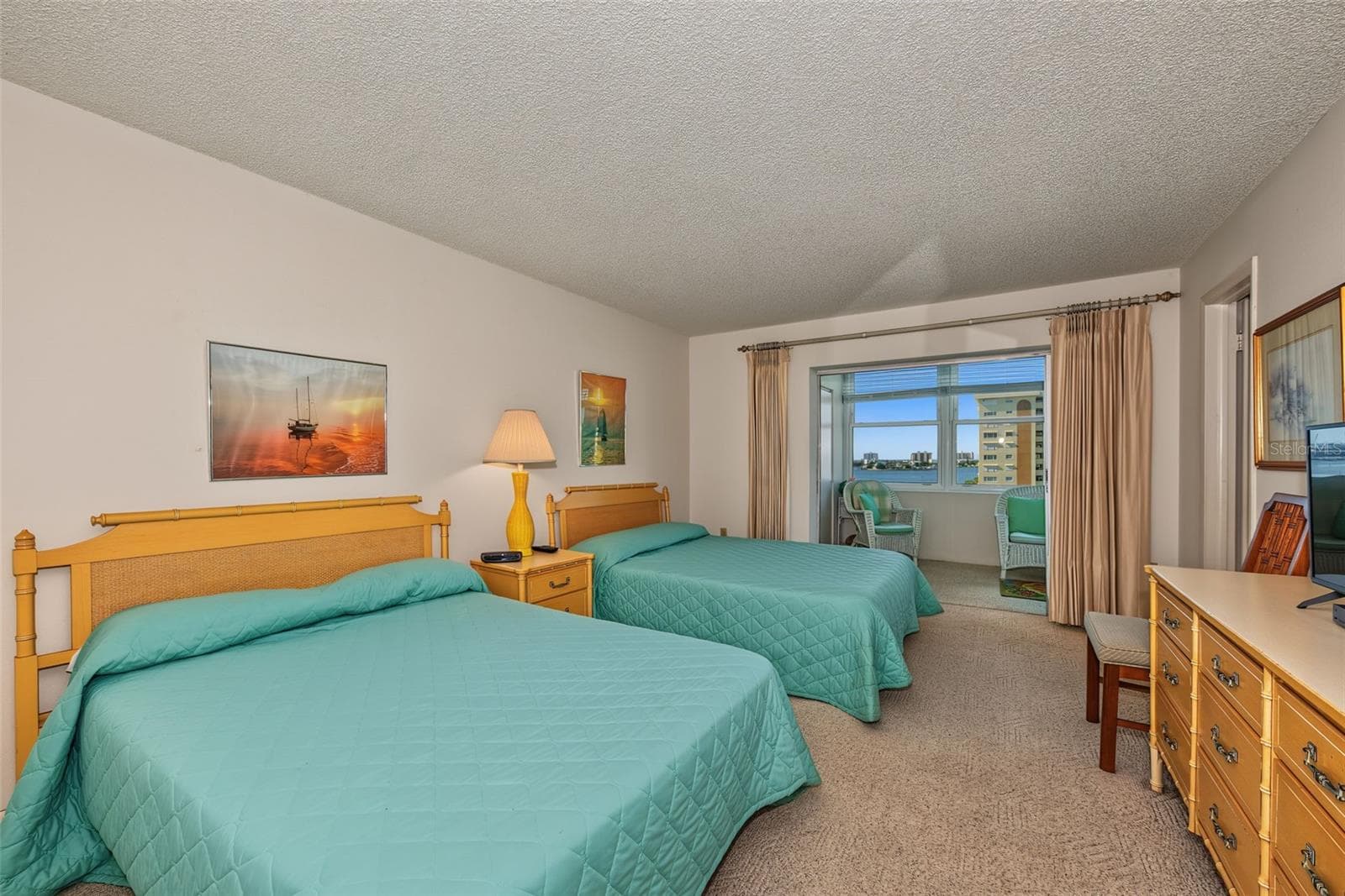 Primary bedroom with access to Lanai - 4575 COVE CIR #709, ST PETERSBURG