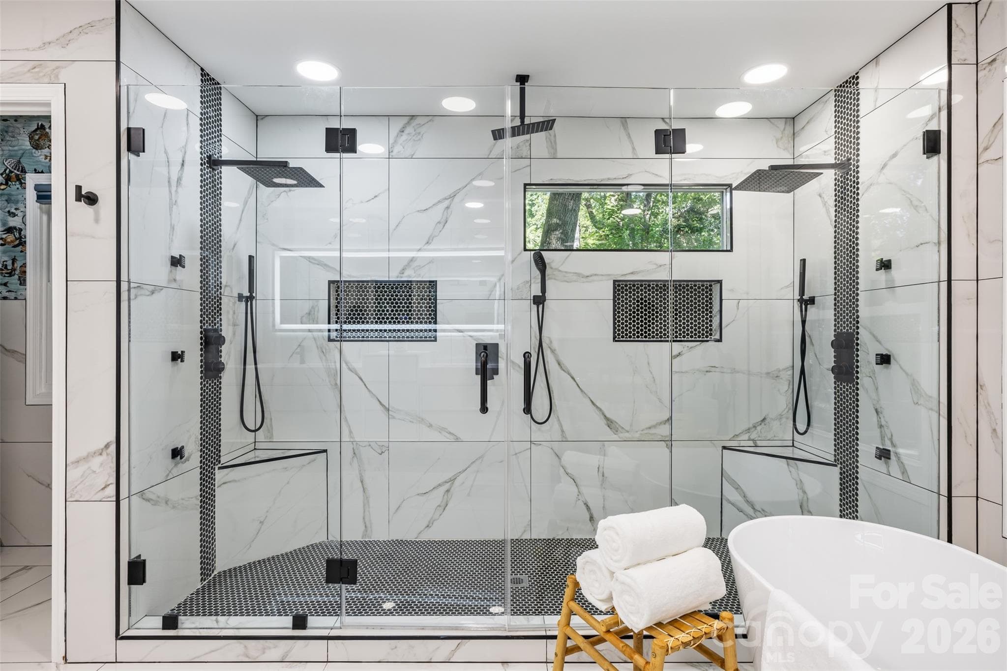A shower so big, you may need a reservation. Enough showerheads that nobody gets left out in the cold. - 16 Tanglewood Road, Lake Wylie