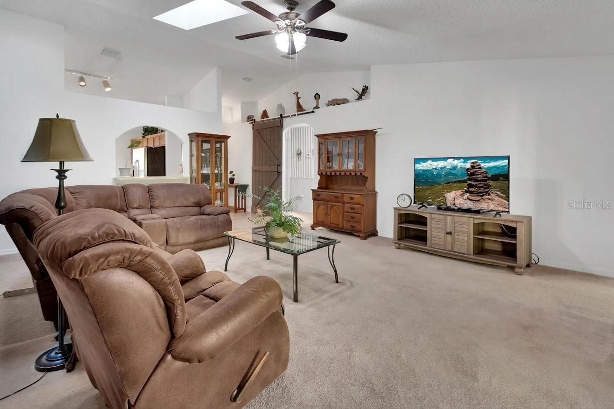 The barn door in the background leads to the multi-gen wing - 9 PERTHSHIRE LN, PALM COAST