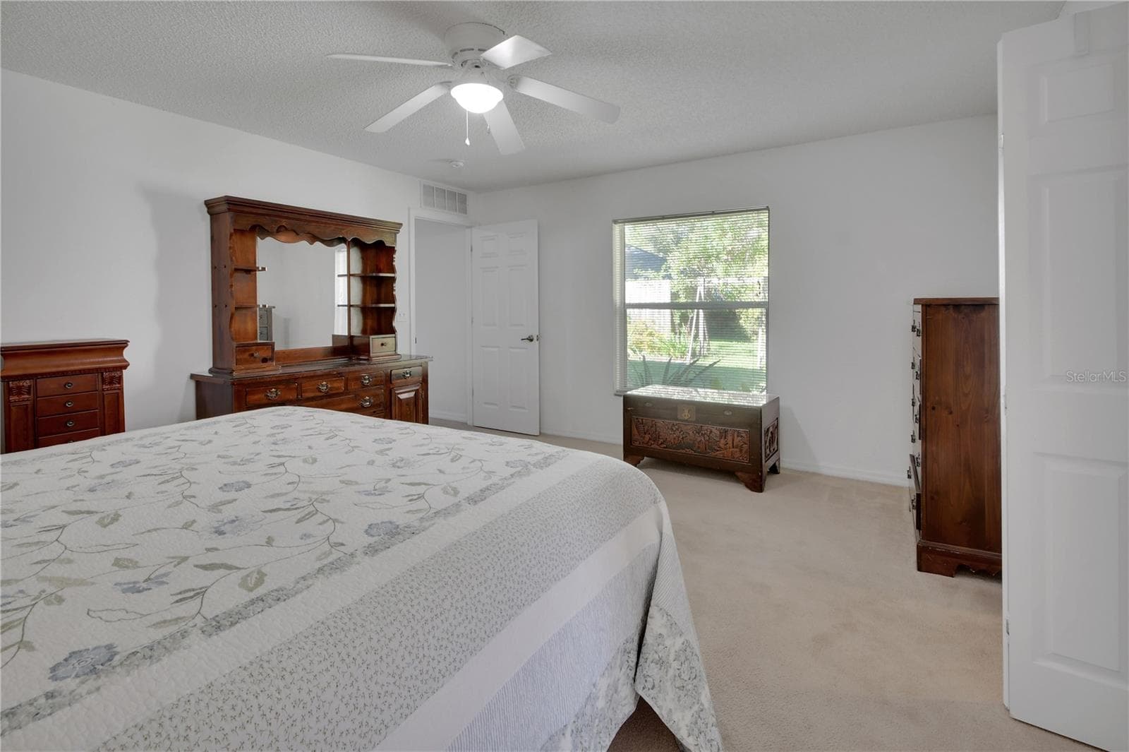 Primary Bedroom has ample space for a sitting area near the window - 9 PERTHSHIRE LN, PALM COAST