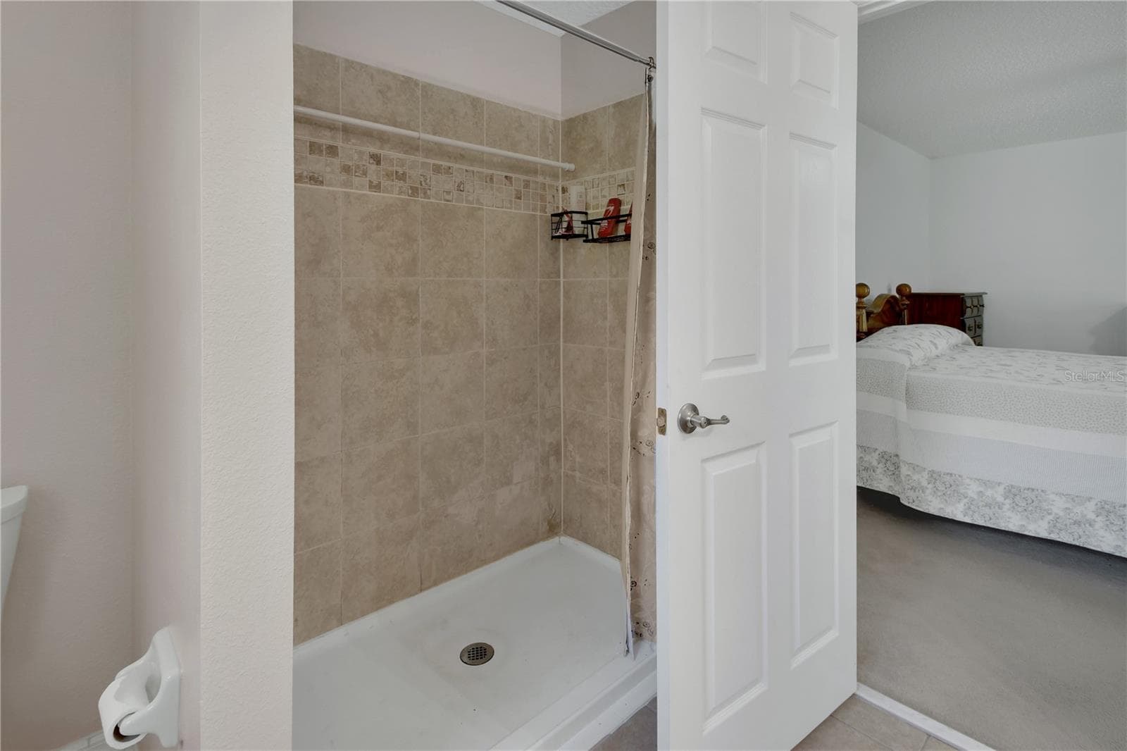 Walk-in tiled shower - 9 PERTHSHIRE LN, PALM COAST