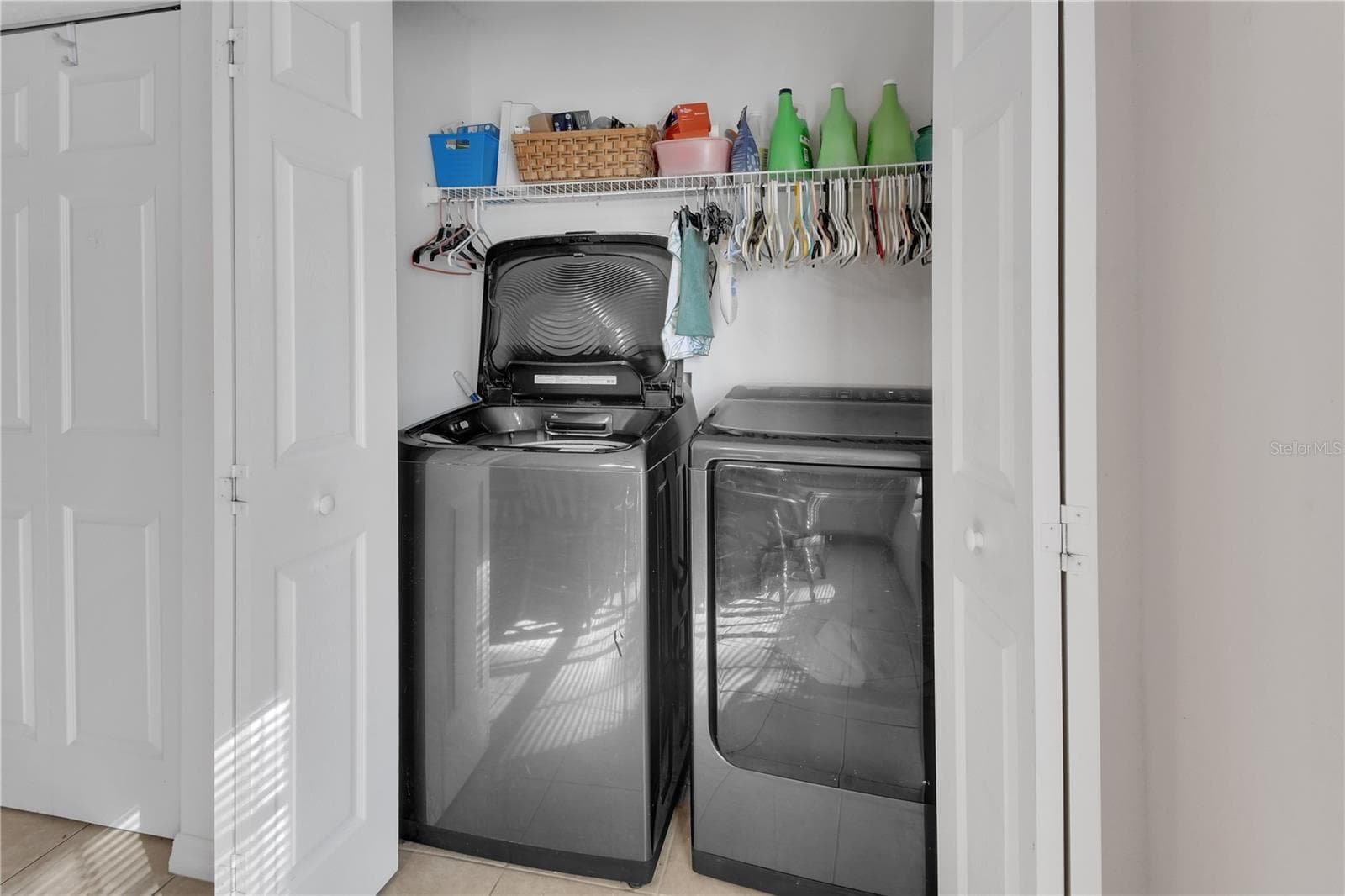 Laundry closet is in the kitchen - 9 PERTHSHIRE LN, PALM COAST