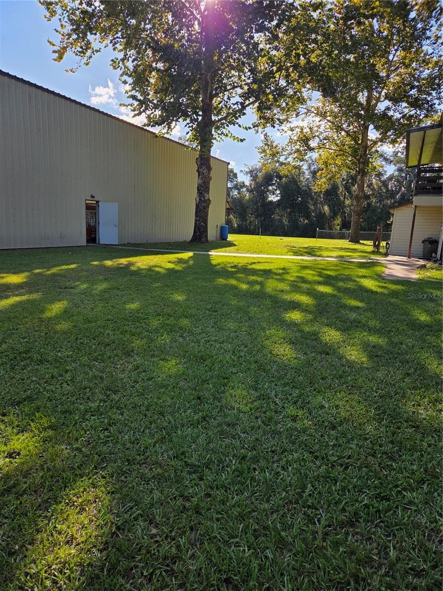 Between house and Hanger - 950 W HIGHWAY 316, CITRA