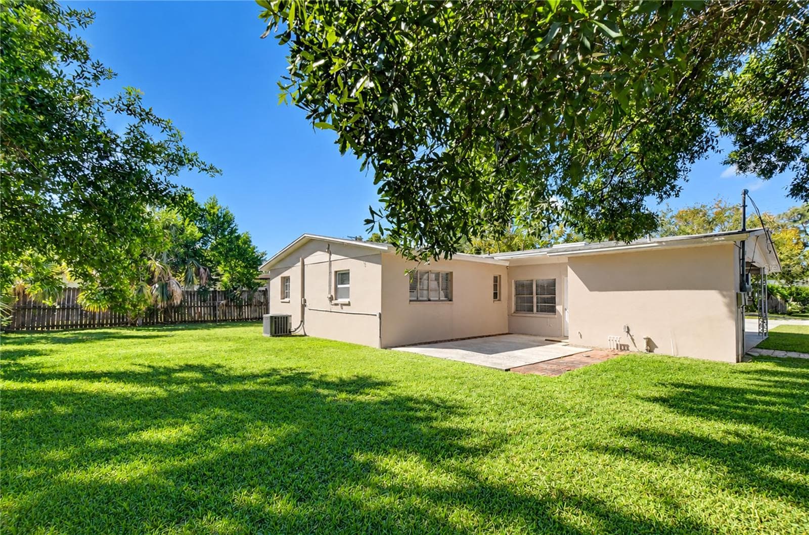 Spacious outdoor retreat offering room for pets, play, and relaxation. - 4508 S LOIS AVE, TAMPA