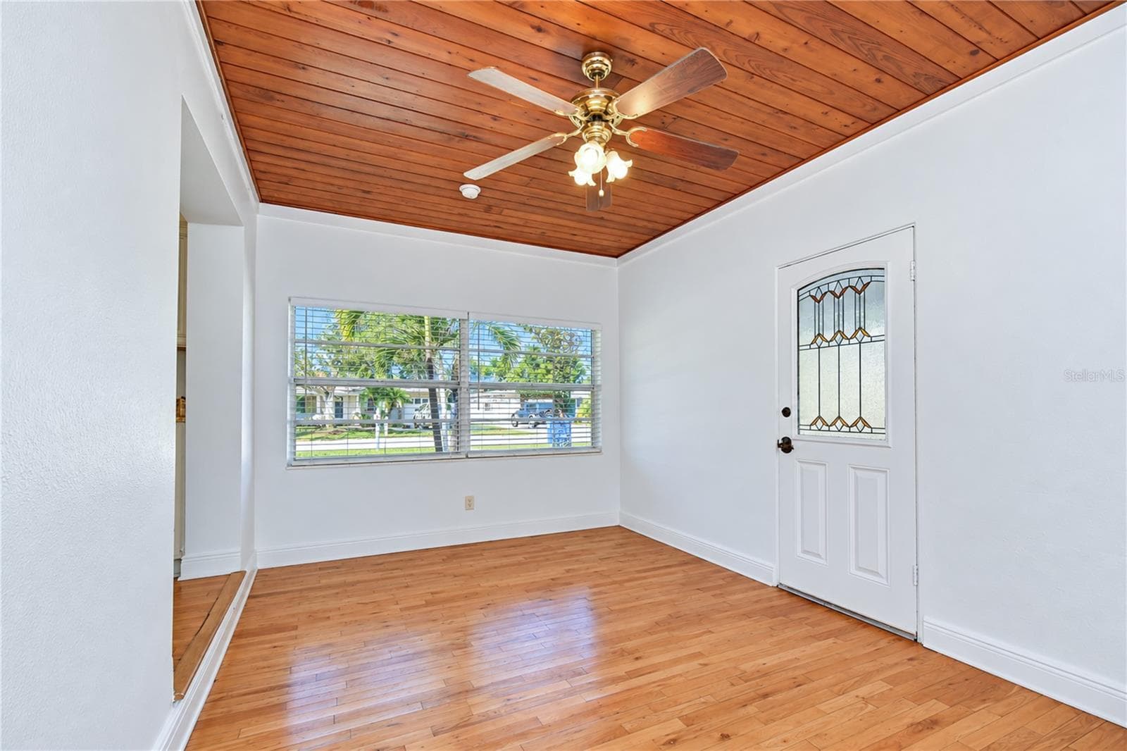Beautiful ceiling detail adds warmth and architectural character to the dining room. - 4508 S LOIS AVE, TAMPA